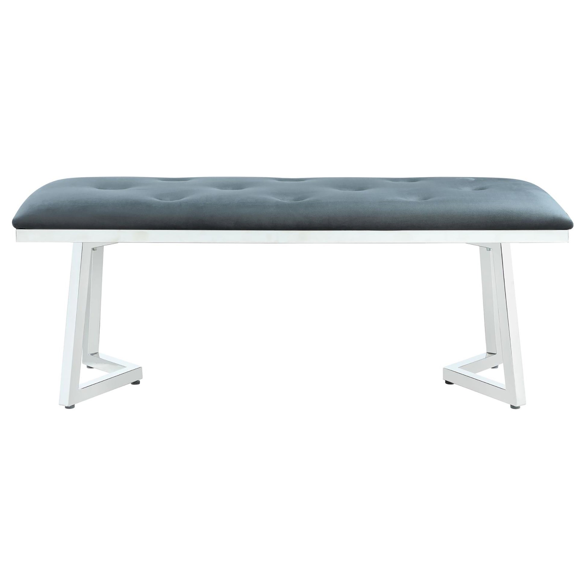 Tufted grey velvet bench with a modern chrome sled base ideal for entryway seating