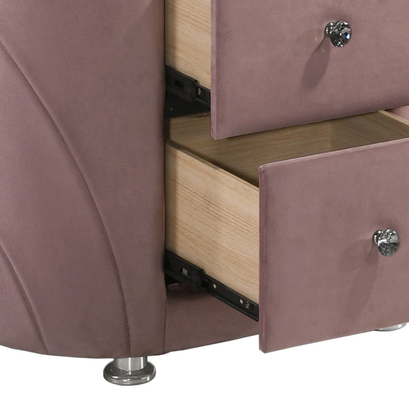 Upholstered nightstand in dusty rose velvet with crystal knobs and light wood drawers