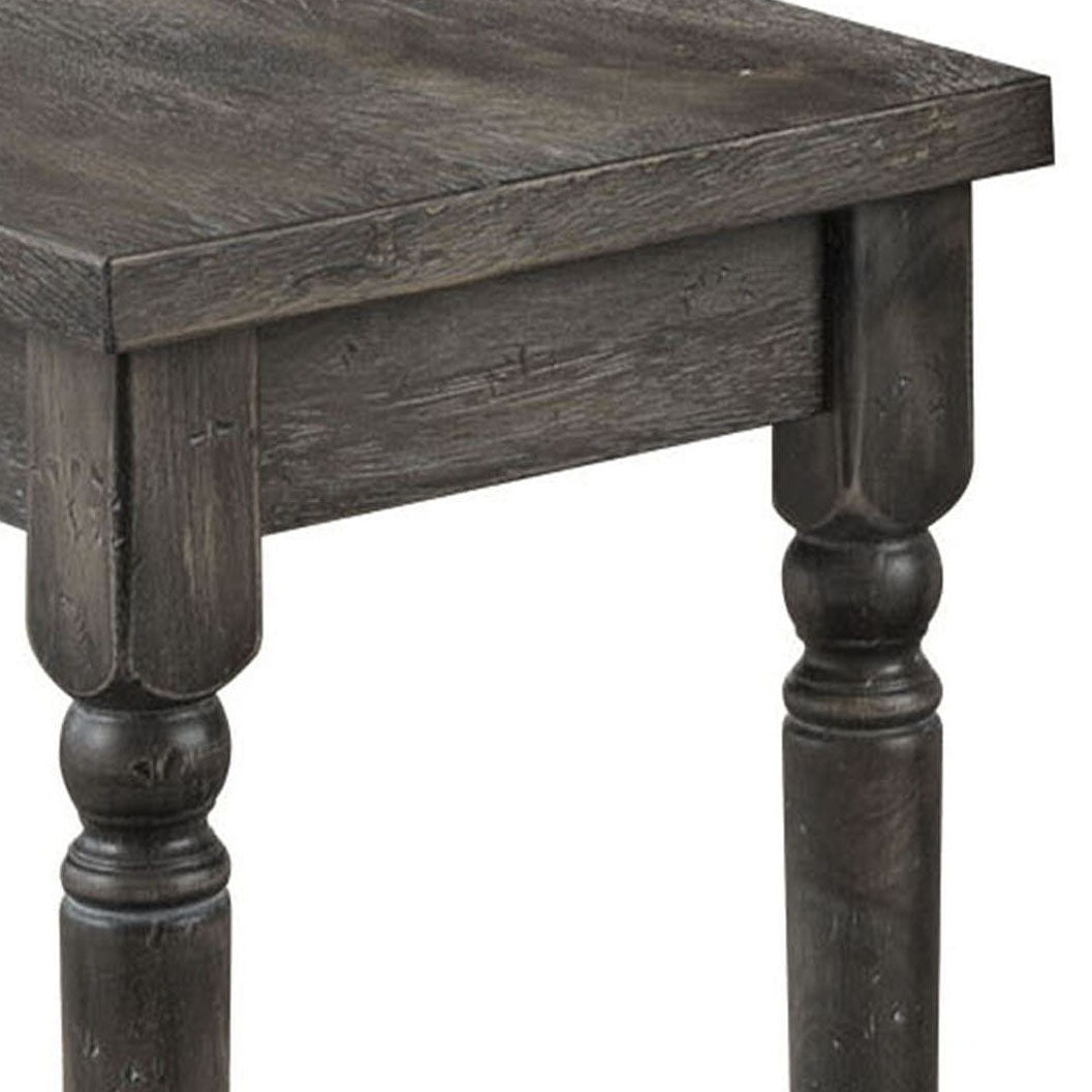 Rustic dark gray wooden accent table with turned legs