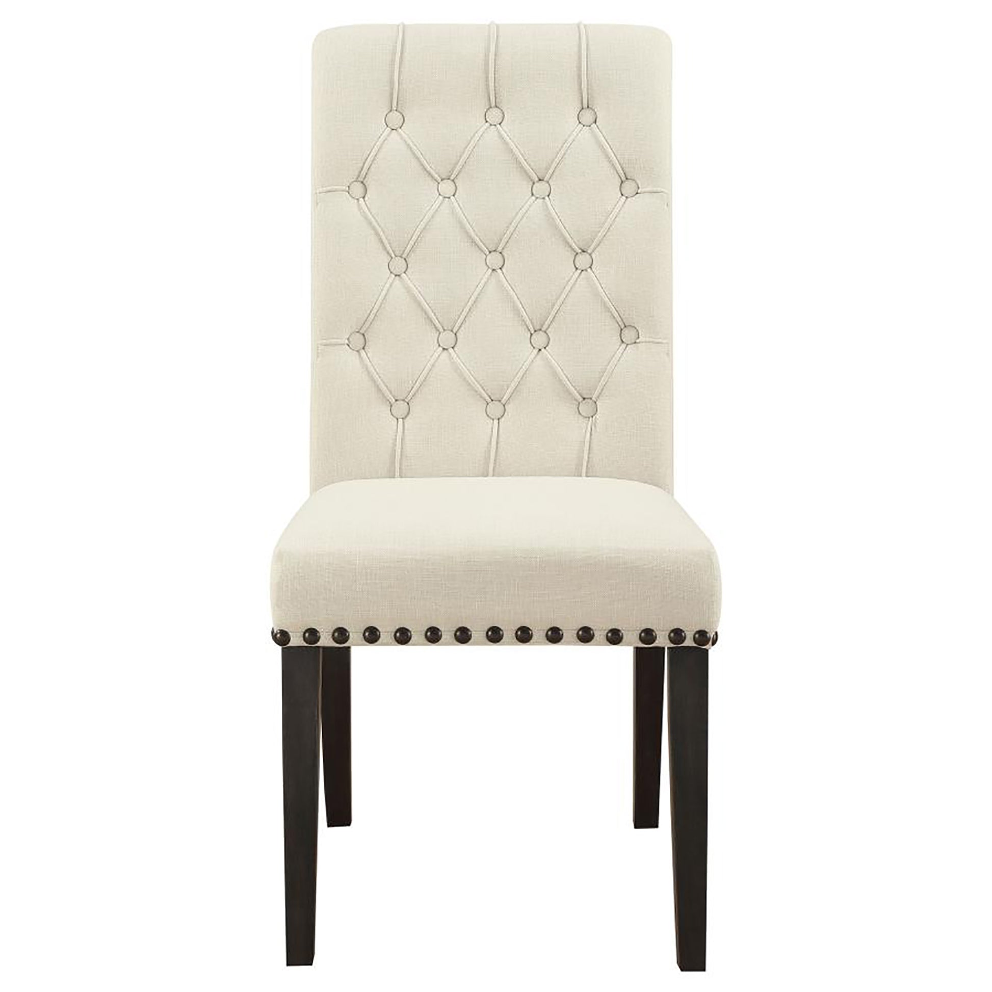 Tufted beige linen dining chair with nailhead trim and dark wood legs