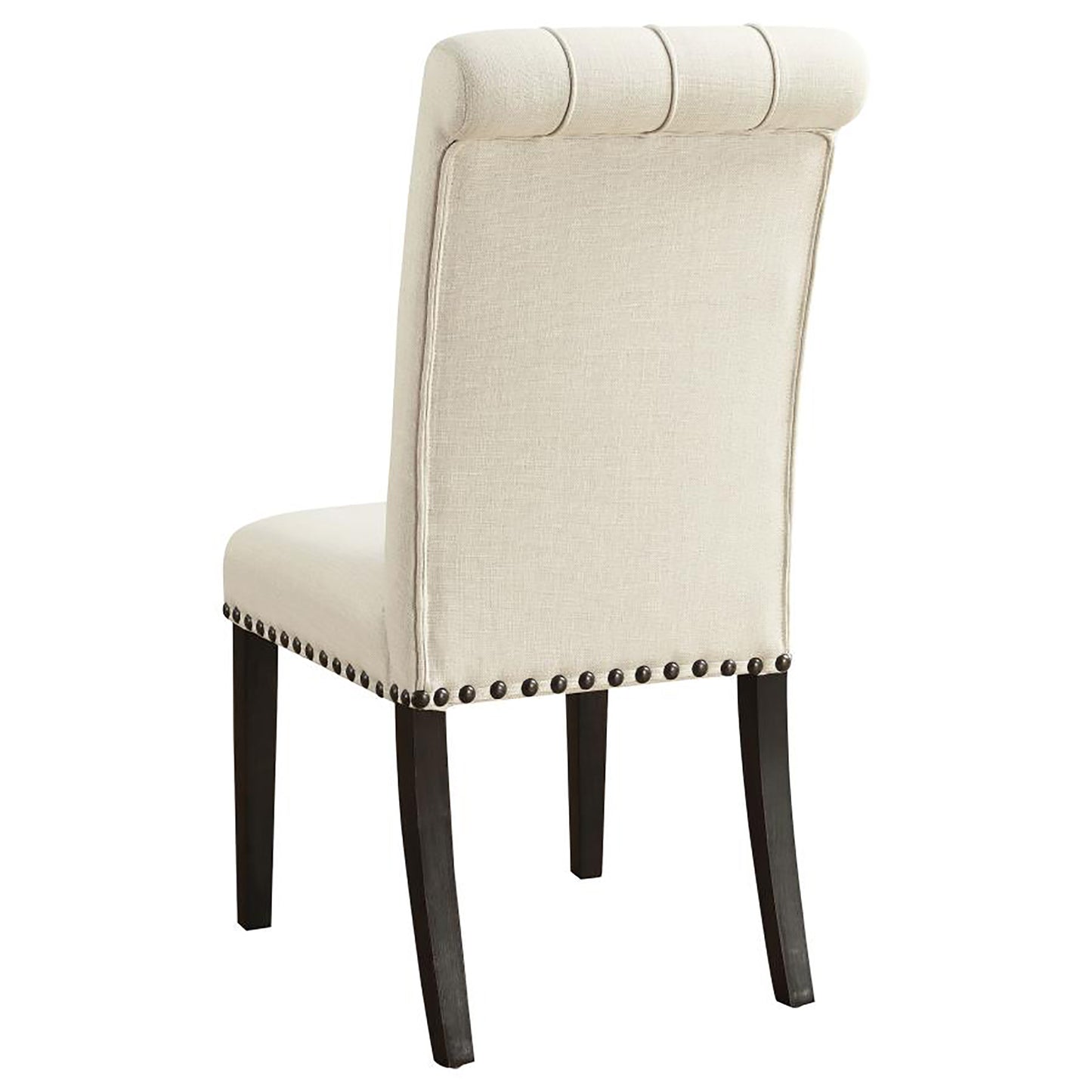 Cream linen dining chair with tufted back nailhead trim and dark wood legs