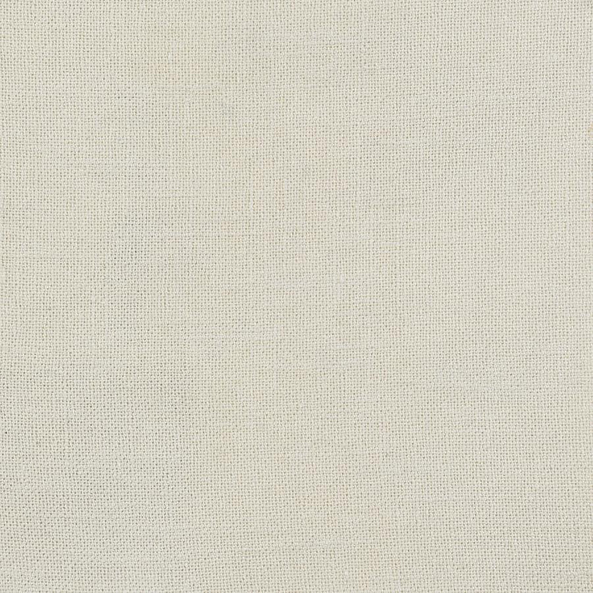 Cream linen fabric with visible weave texture ideal for upholstery projects