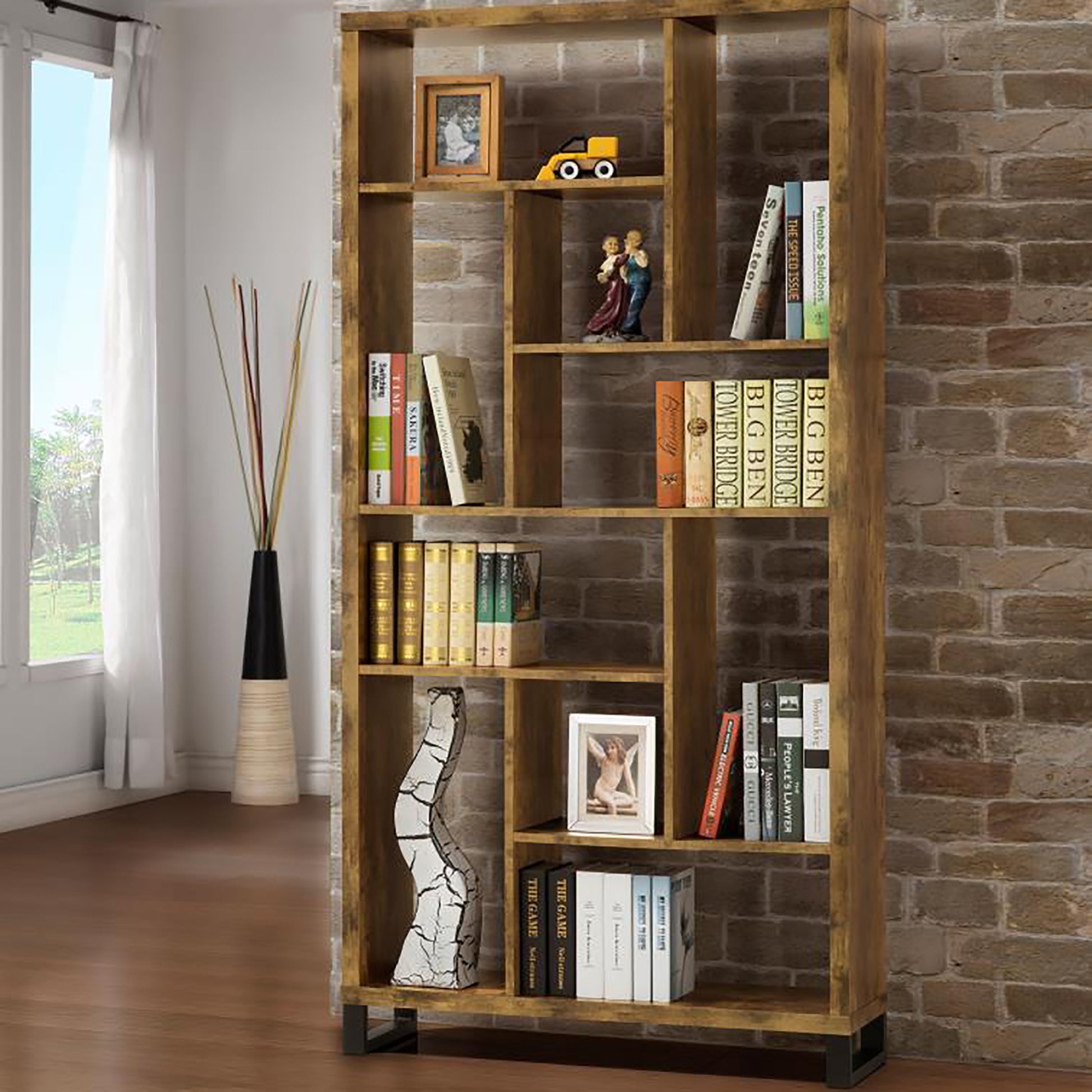Rustic wood bookshelf filled with books decorative figurines and a framed photo