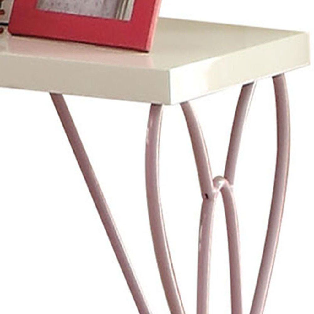 Creamcolored shelf with decorative pink metal legs a charming accent piece