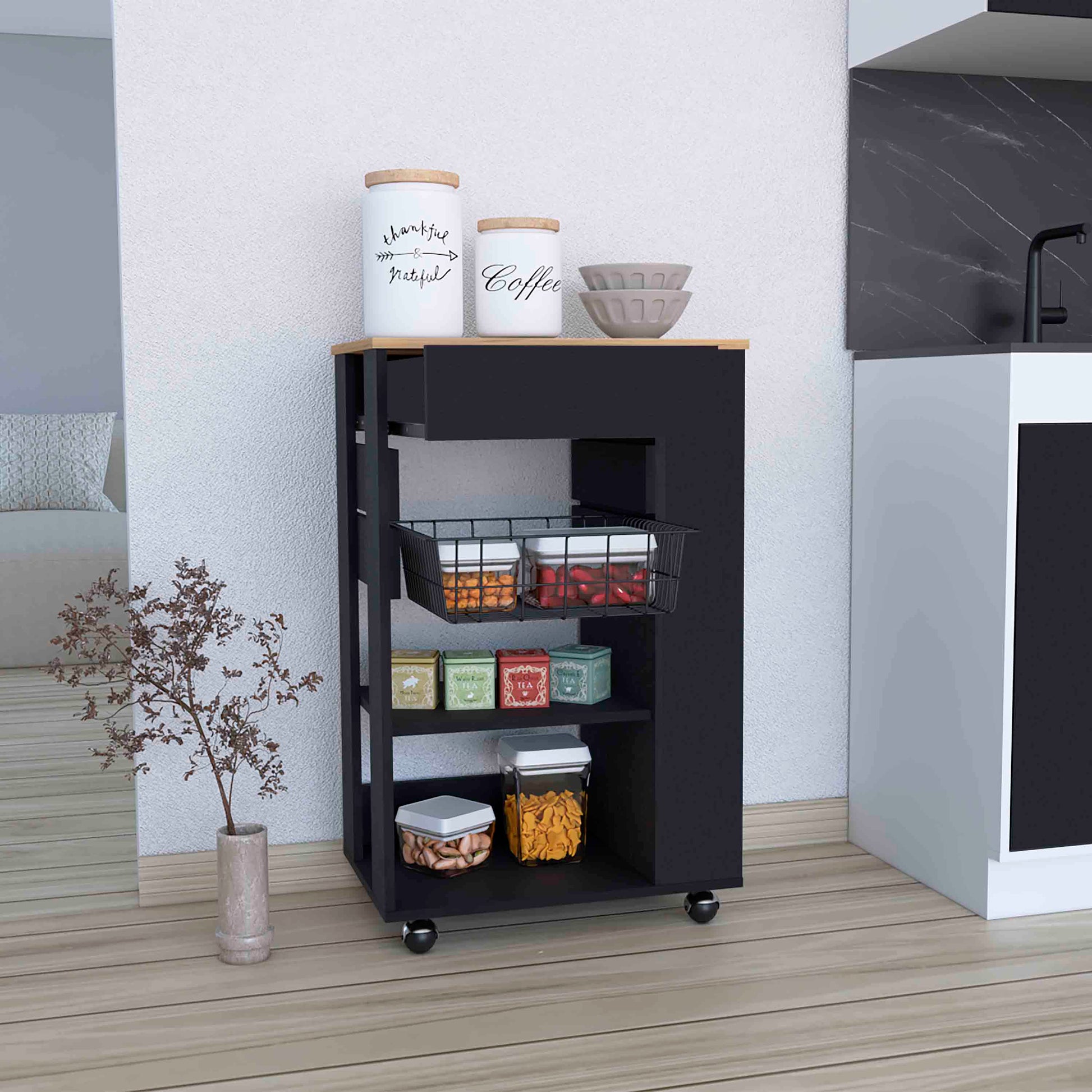 Black kitchen cart with wood top and wire basket shelves holding pantry items