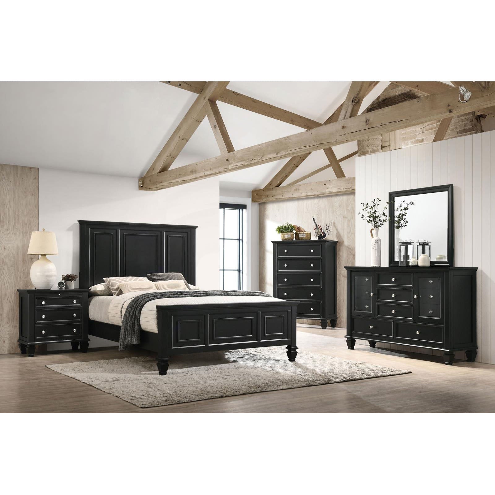 Black wood panel bed frame with coordinated nightstand dresser and chest