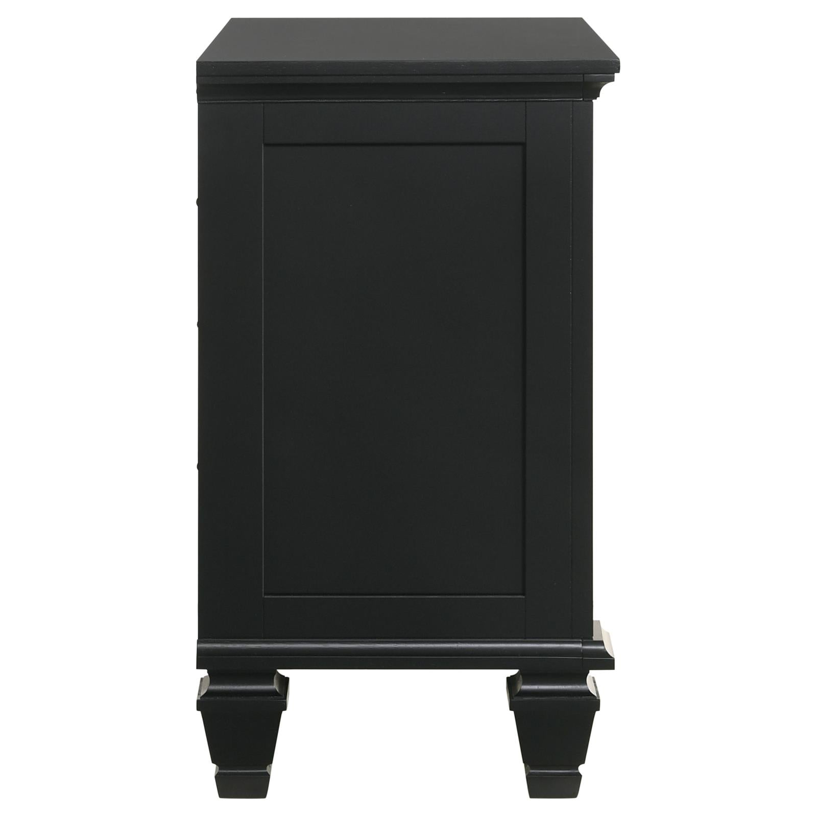 Black wooden bedside table with carved detailing and tapered legs