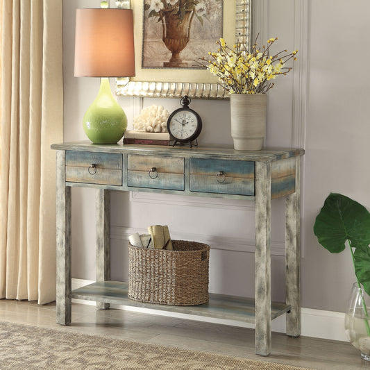 Distressed teal and wood finish console table with three drawers and a lower shelf
