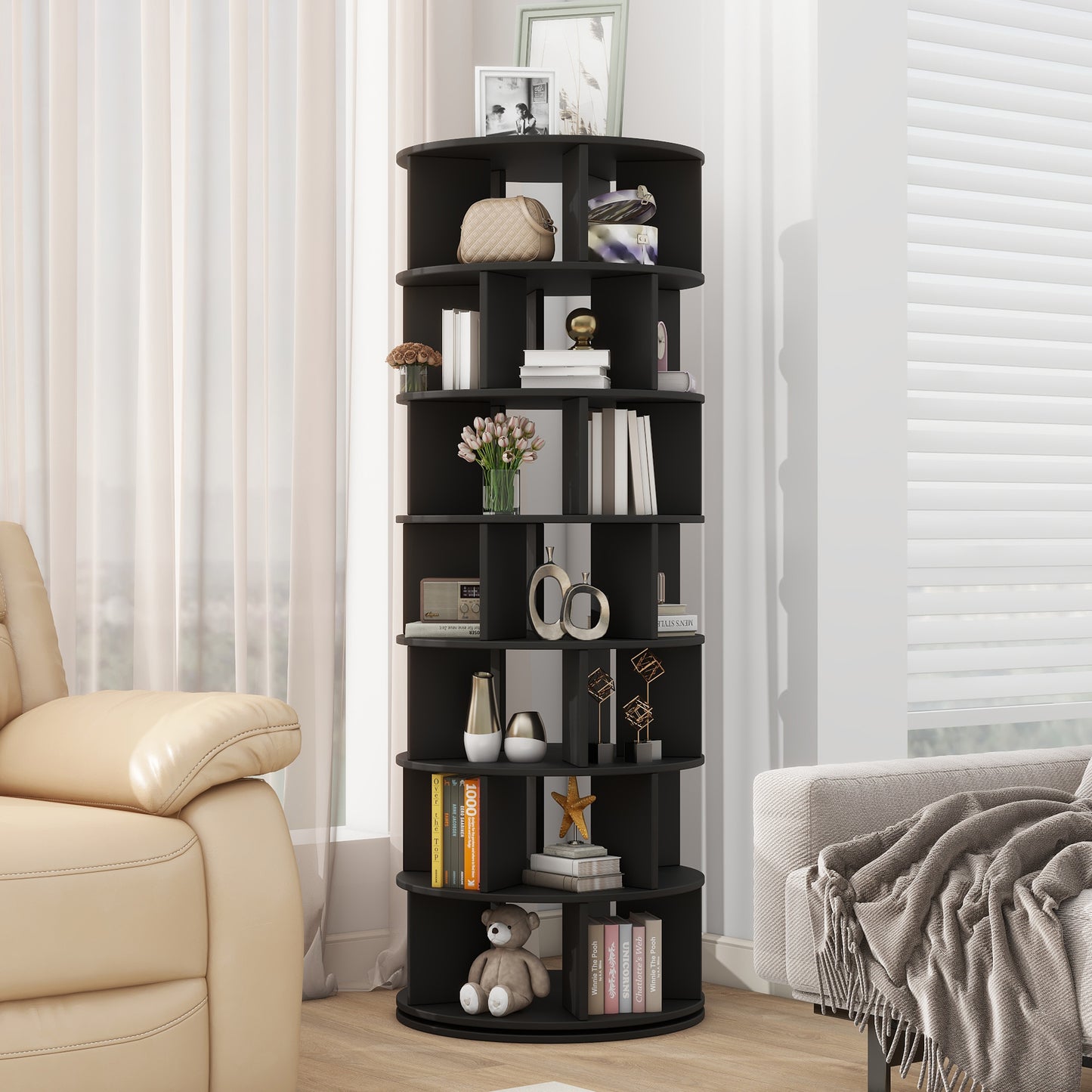 Black modern tier revolving bookshelf with decorative items and books for home storage