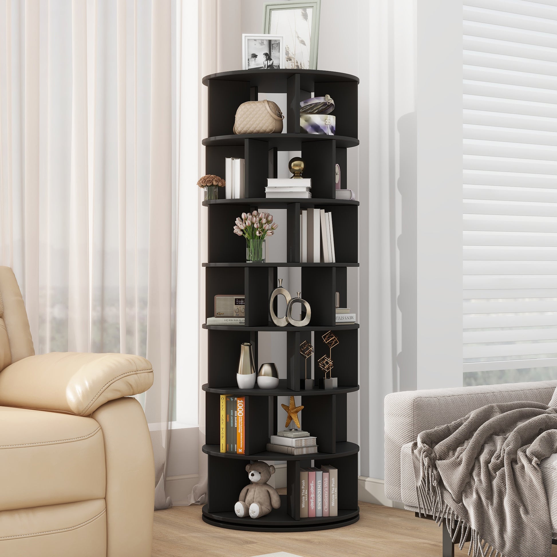 Black modern tier revolving bookshelf with decorative items and books for home storage