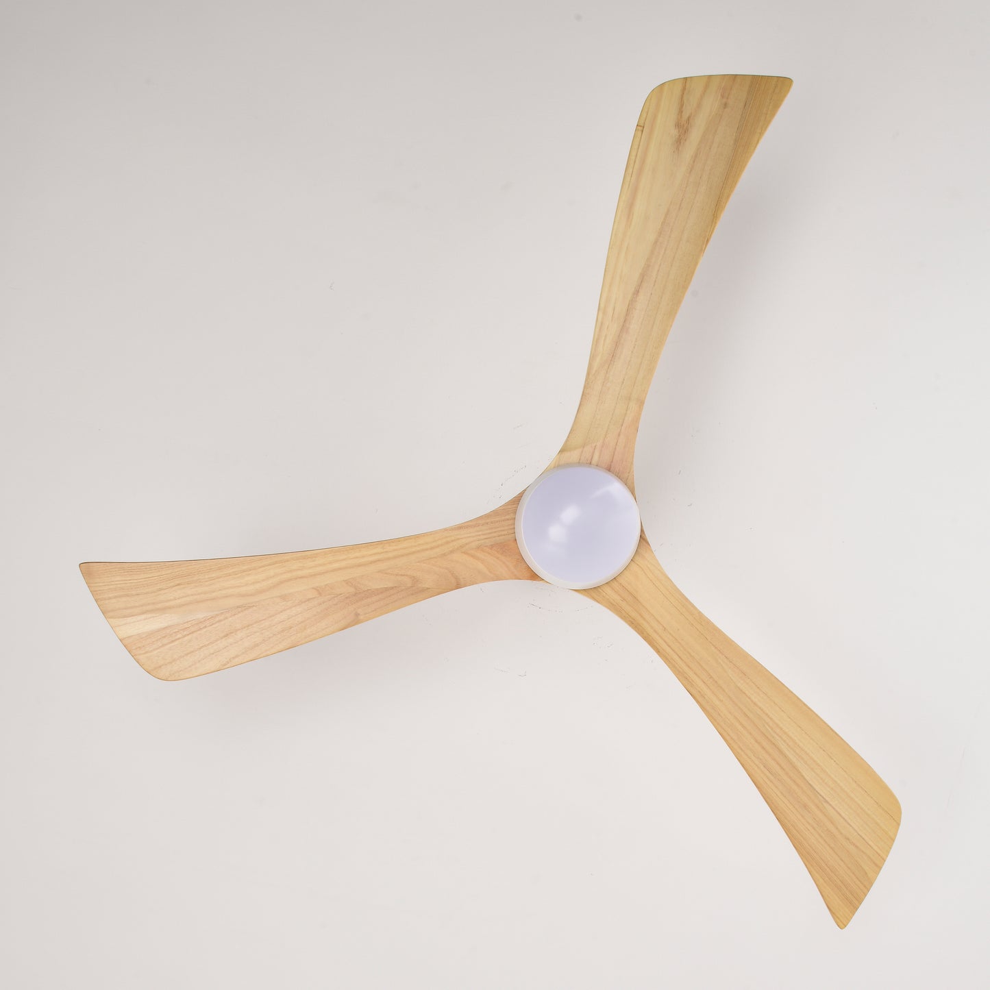 Natural wood ceiling fan with three curved blades and integrated light fixture