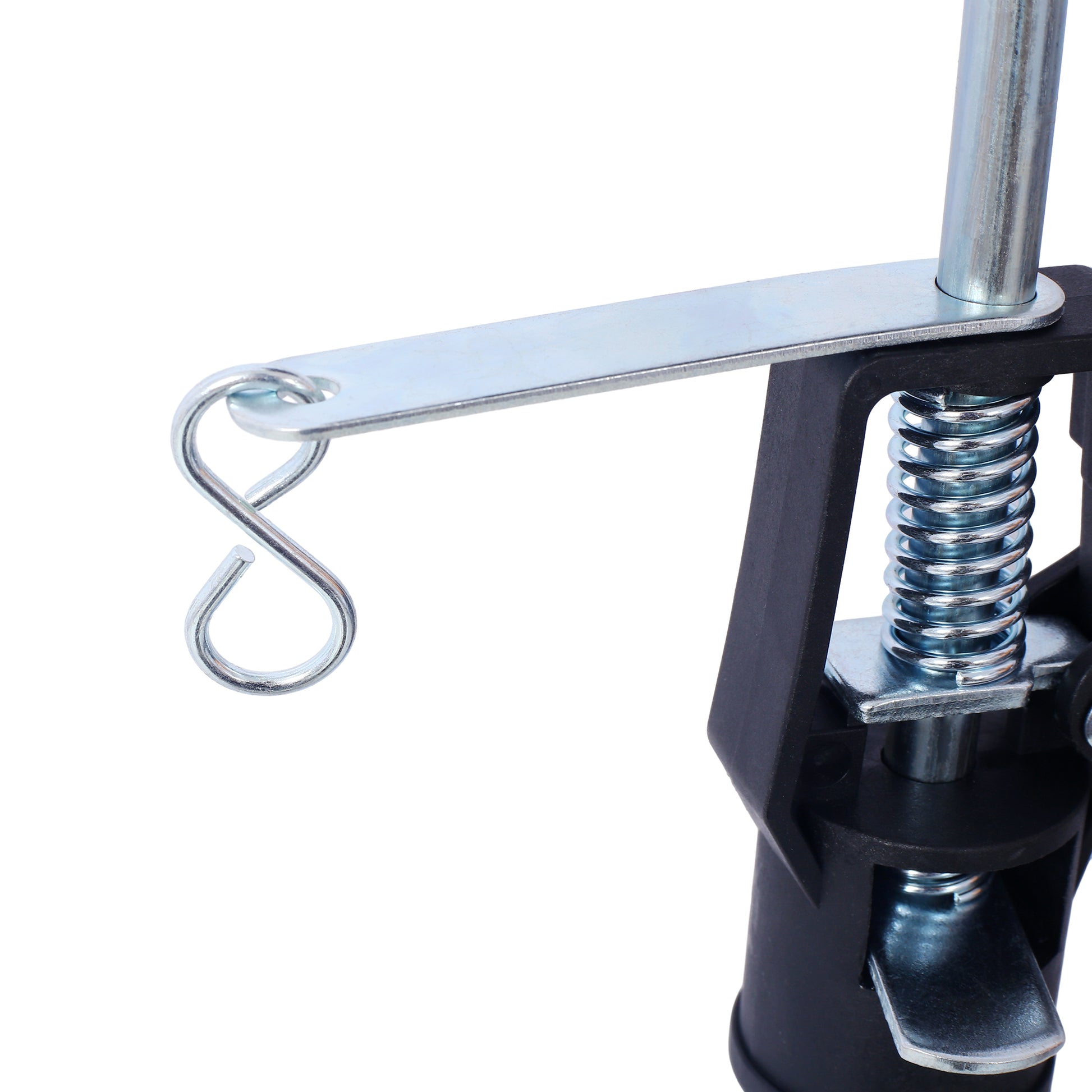 Closeup of a black plastic clamp with a silver metal spring and hook