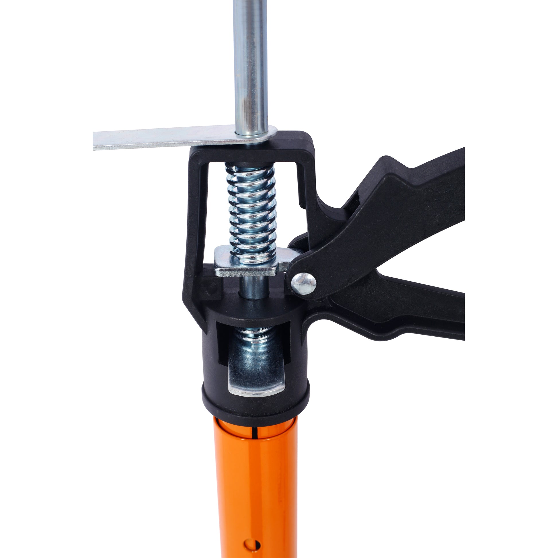Closeup of heavyduty caulk gun mechanism with orange handle and steel spring