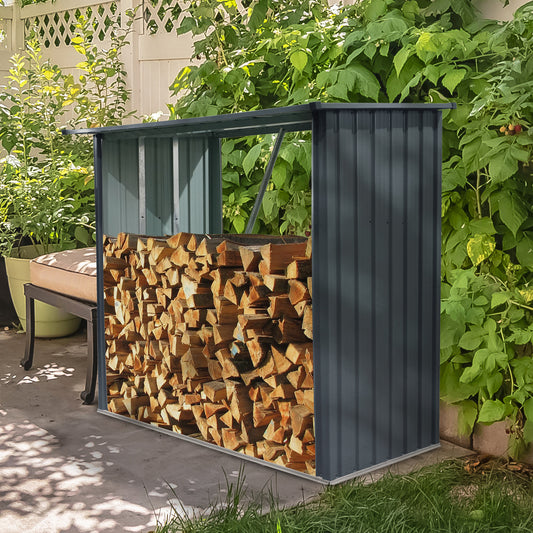 Modern gray metal log storage shed filled with neatly stacked firewood outdoors