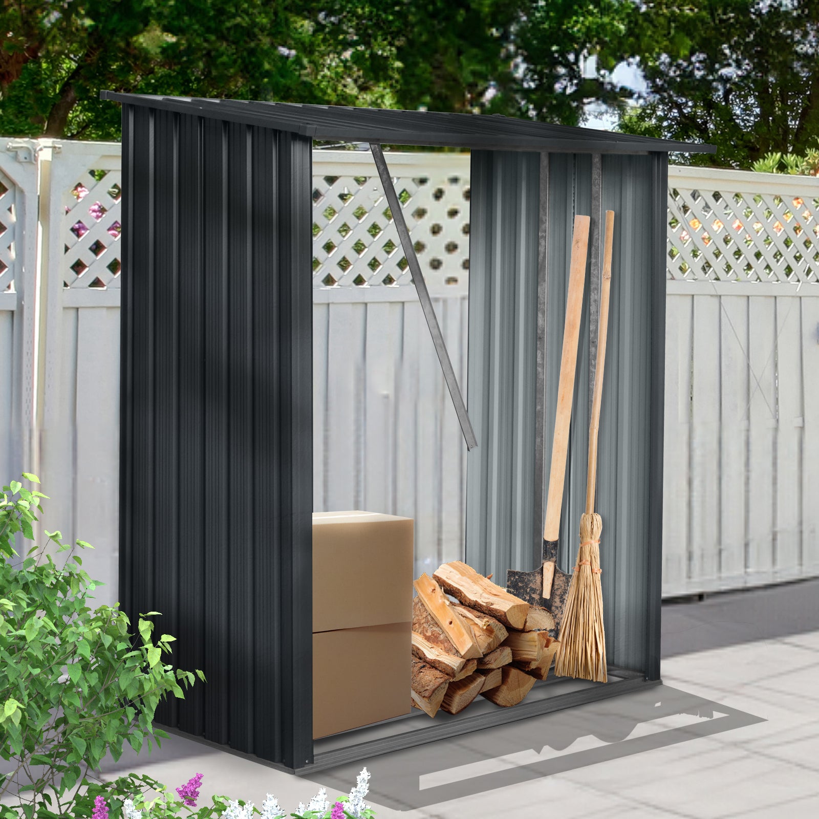 Dark gray metal garden shed storing firewood boxes a shovel and a broom