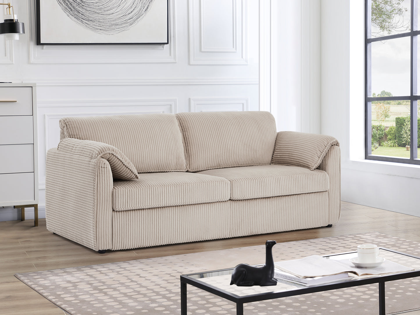 Beige corduroy sofa with plush cushions and rolled arms