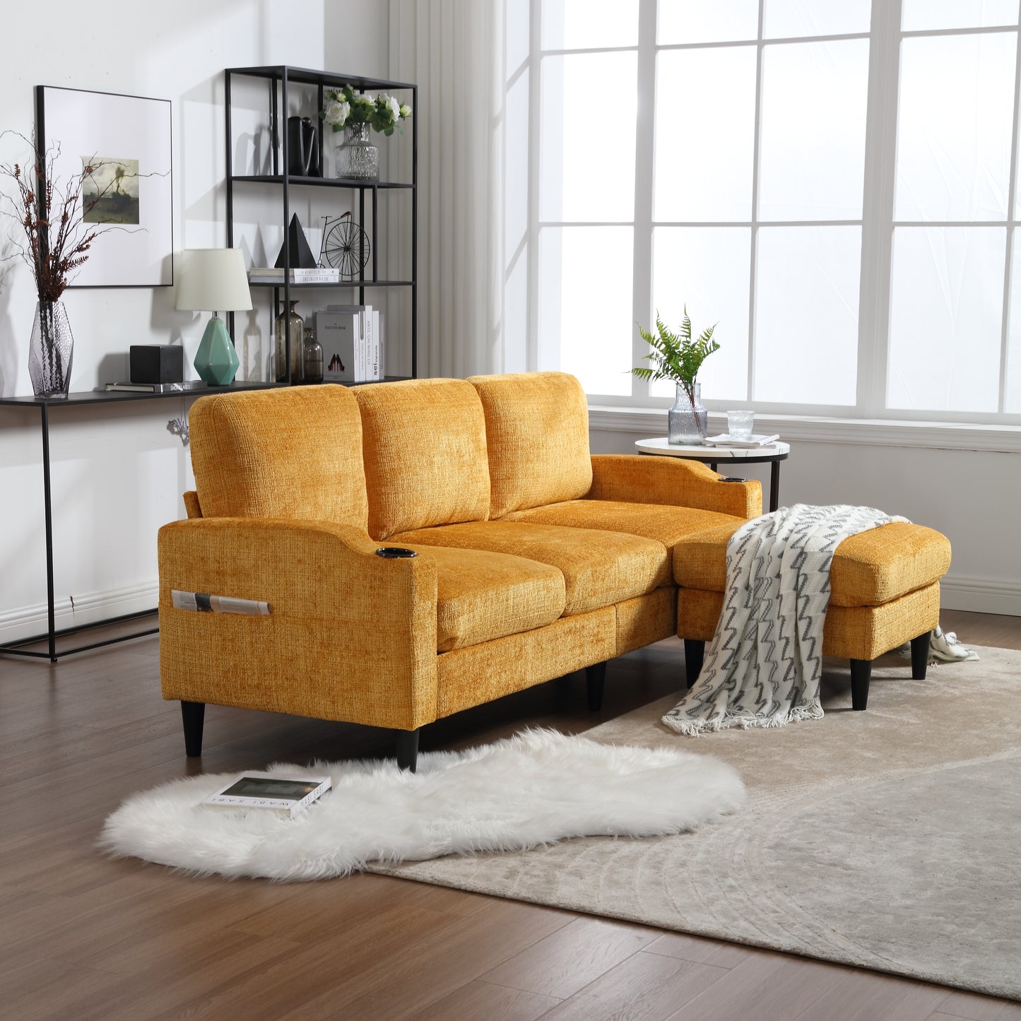 Mustard yellow upholstered sectional sofa with ottoman and builtin cup holder