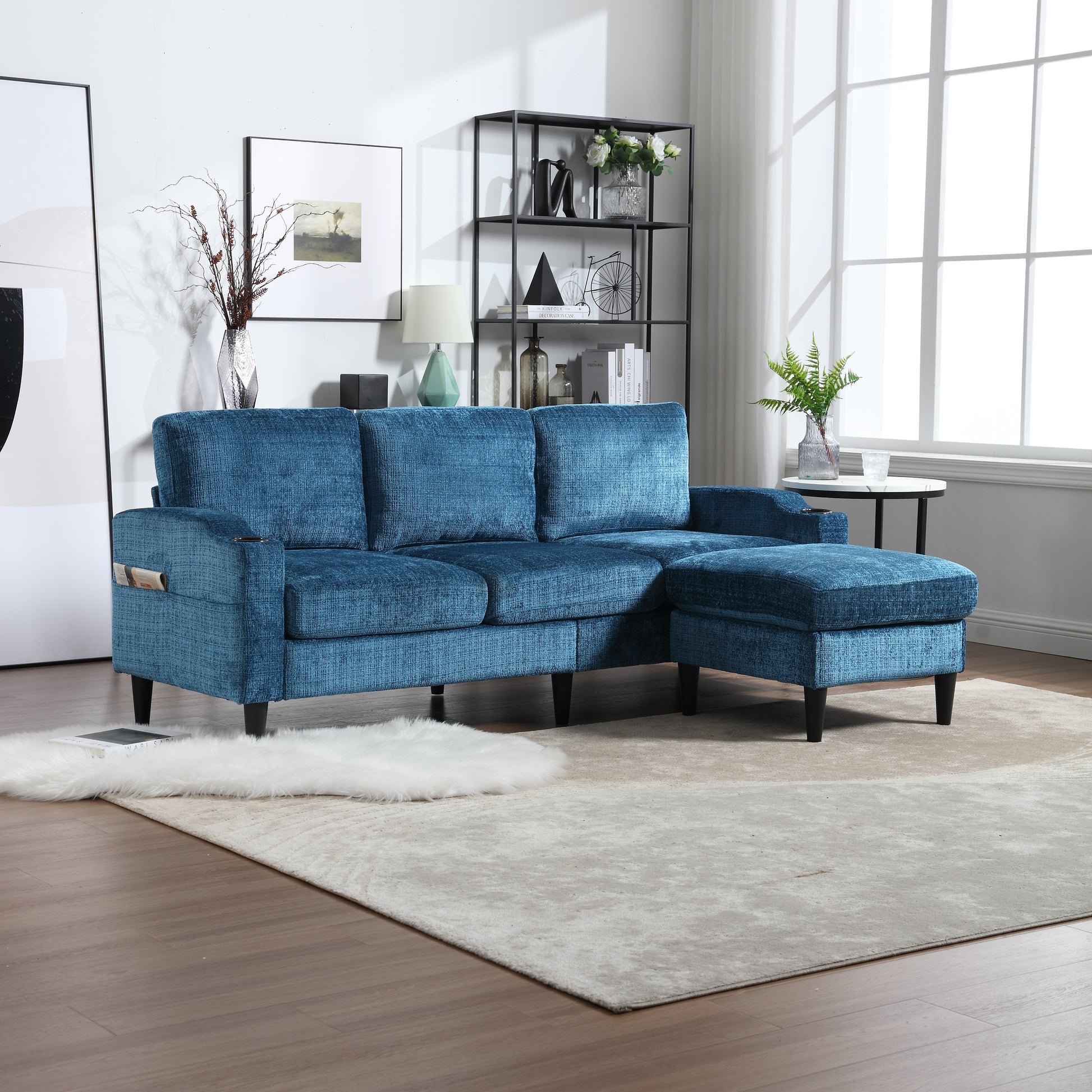 Deep teal textured fabric sectional sofa with chaise and matching ottoman