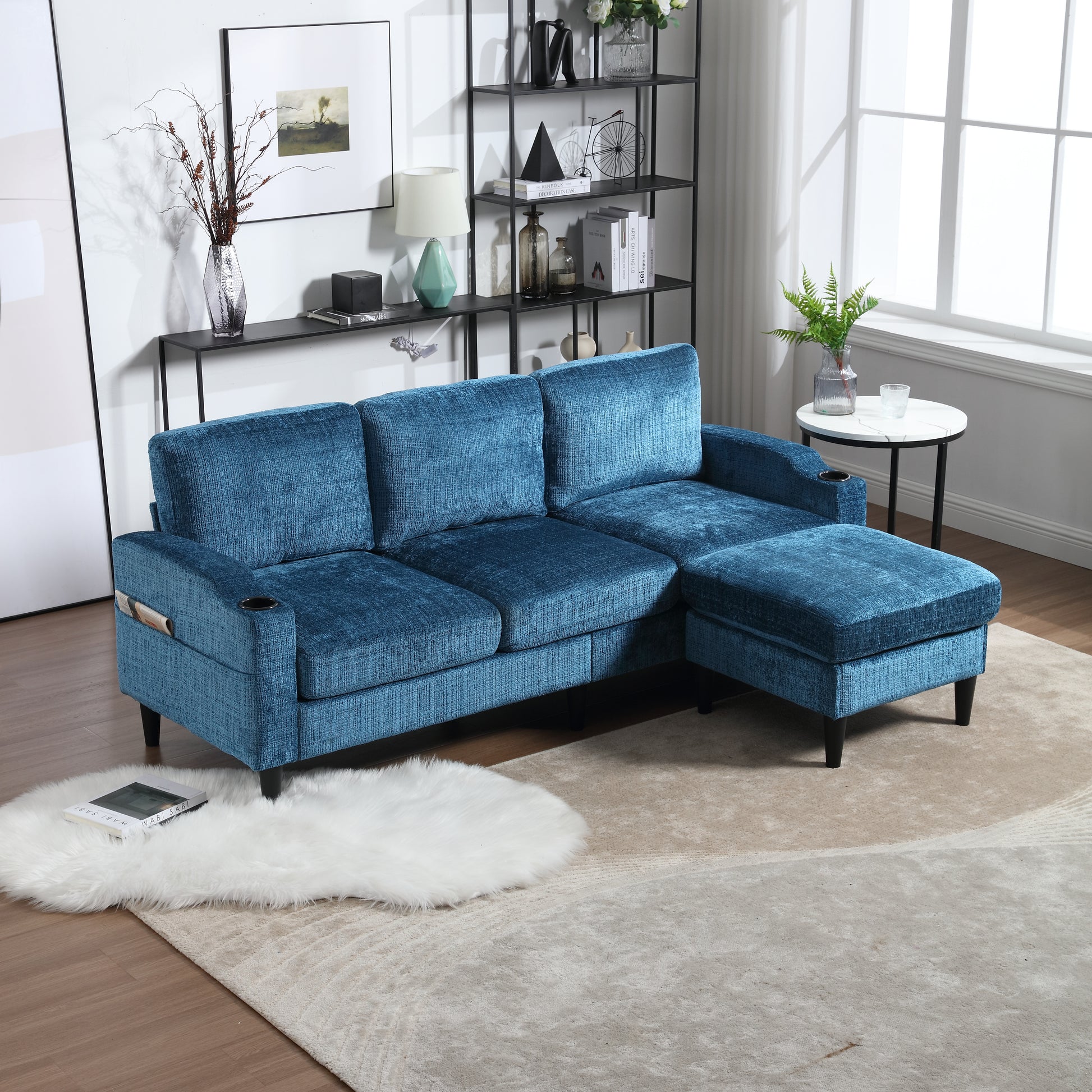 Deep blue textured fabric sectional sofa with chaise and builtin cup holders