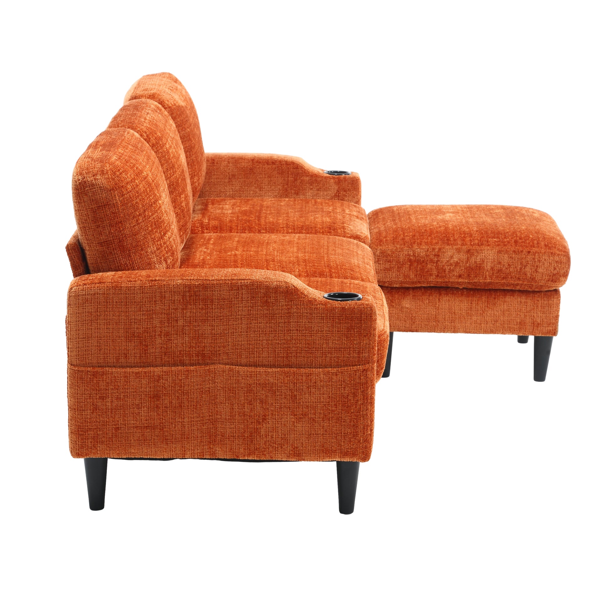 Plush orange velvet sofa with builtin cup holders and a matching ottoman