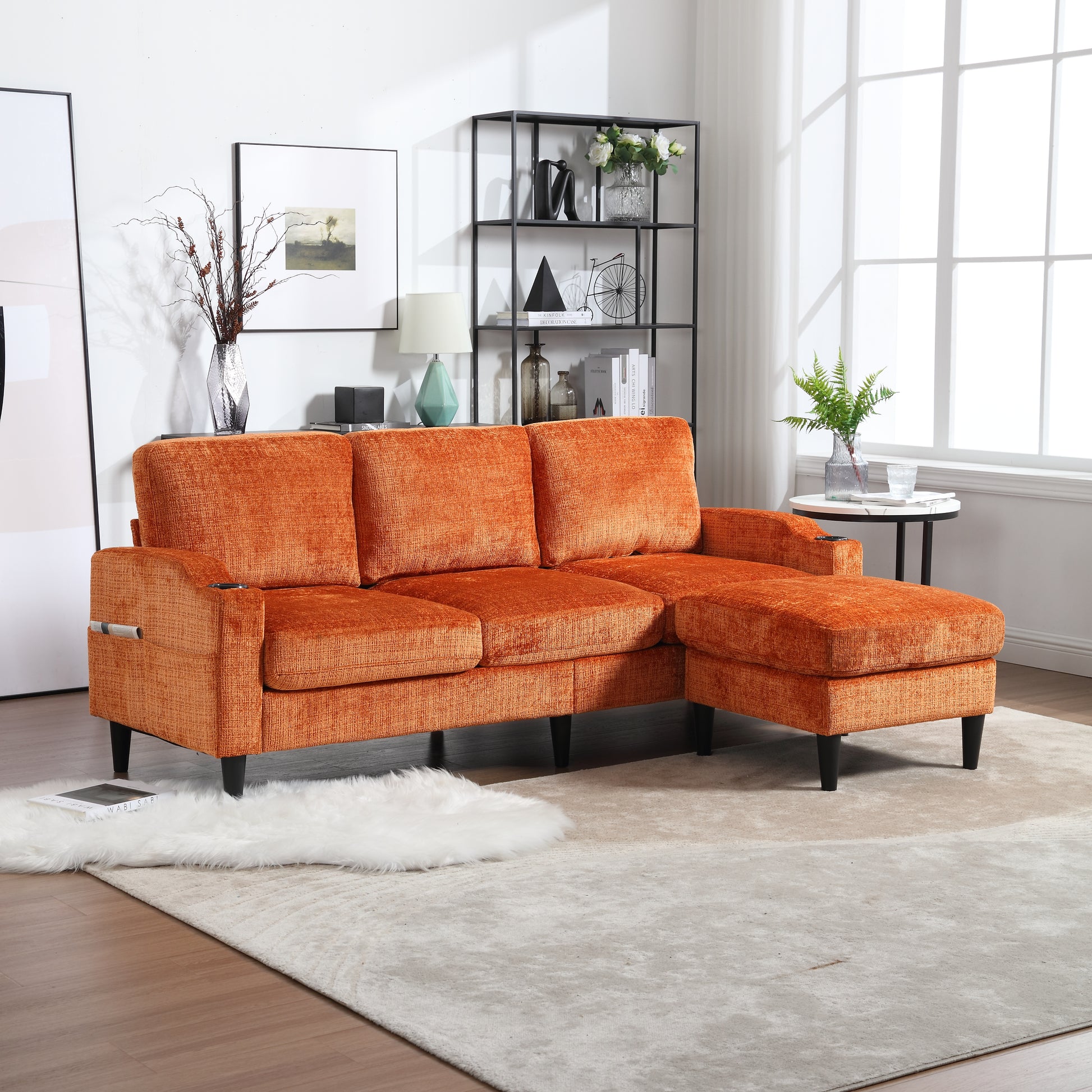 Orange sectional sofa with chaise lounge and builtin cup holders