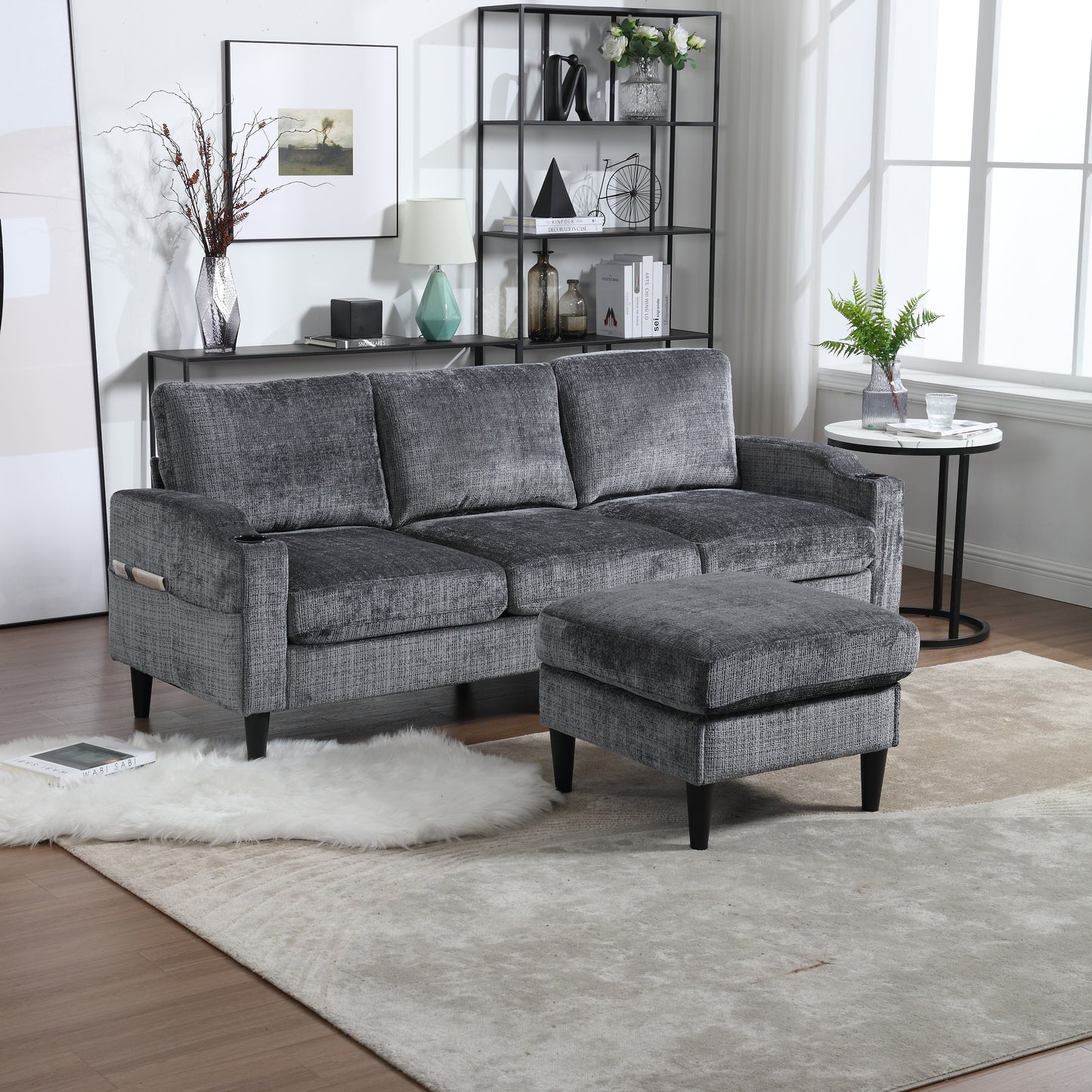 Dark grey textured fabric sofa with matching ottoman perfect for modern living rooms