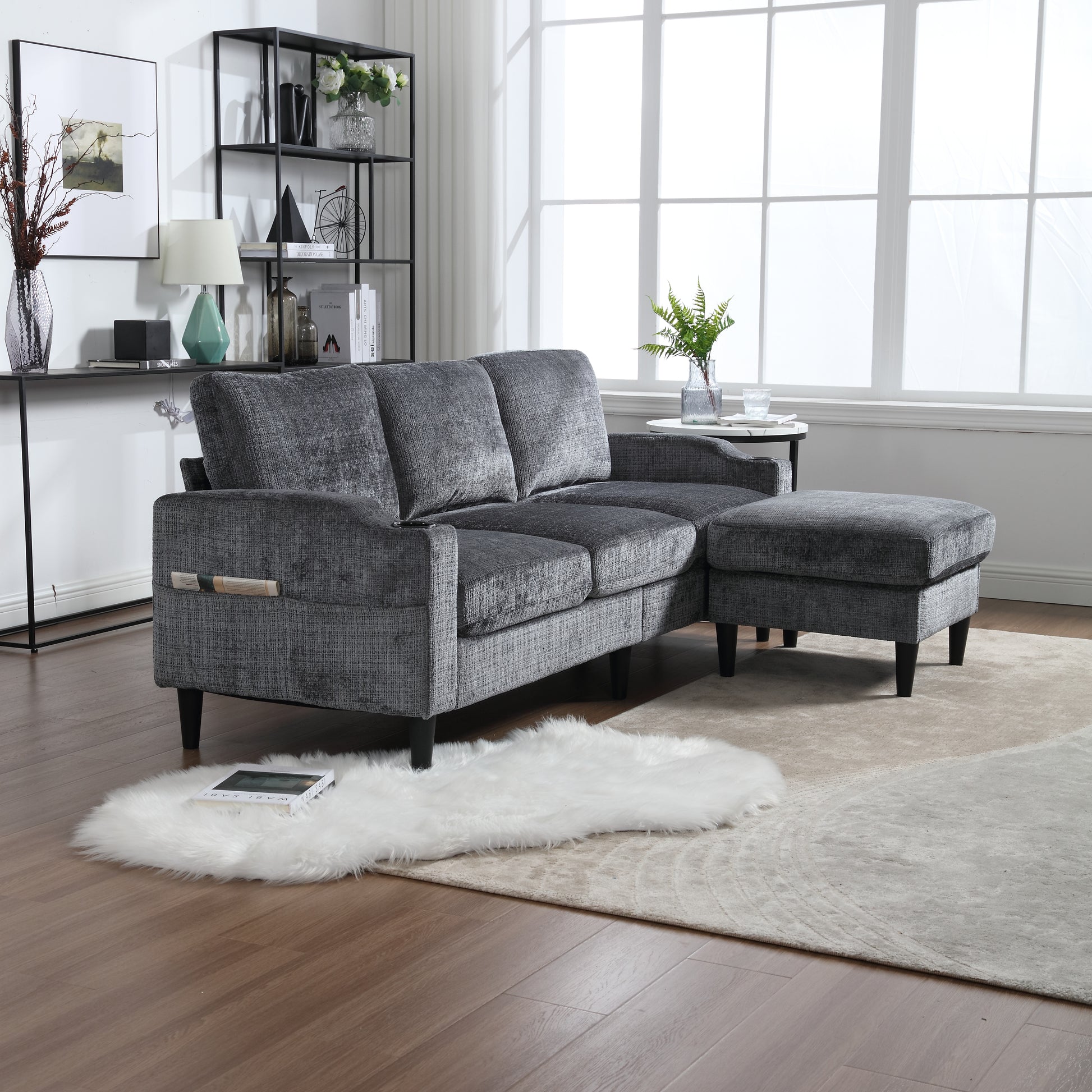 Gray sectional sofa with chaise lounge plush fabric upholstery and black tapered legs