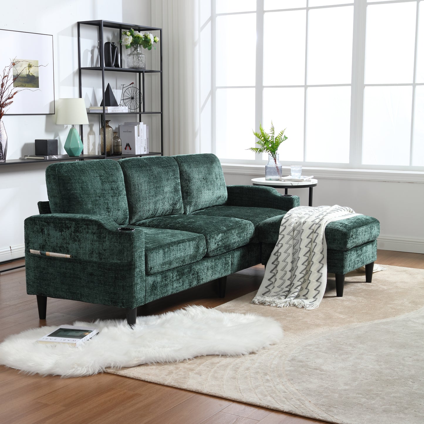 Plush emerald green velvet sectional sofa with chaise and builtin cup holders