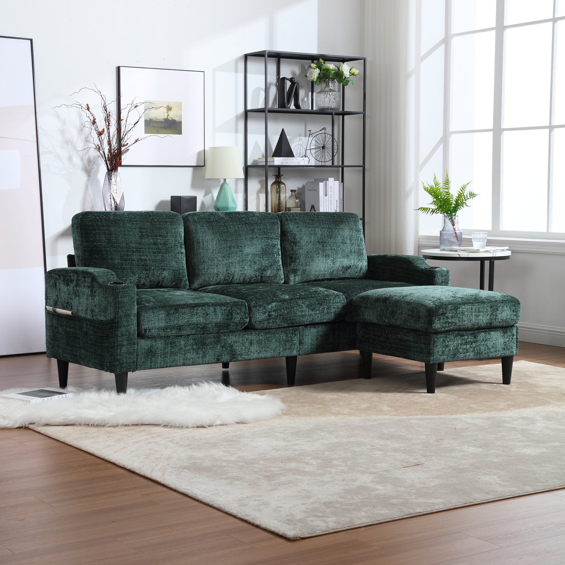 Deep green velvet sectional sofa with chaise and ottoman perfect for living room seating