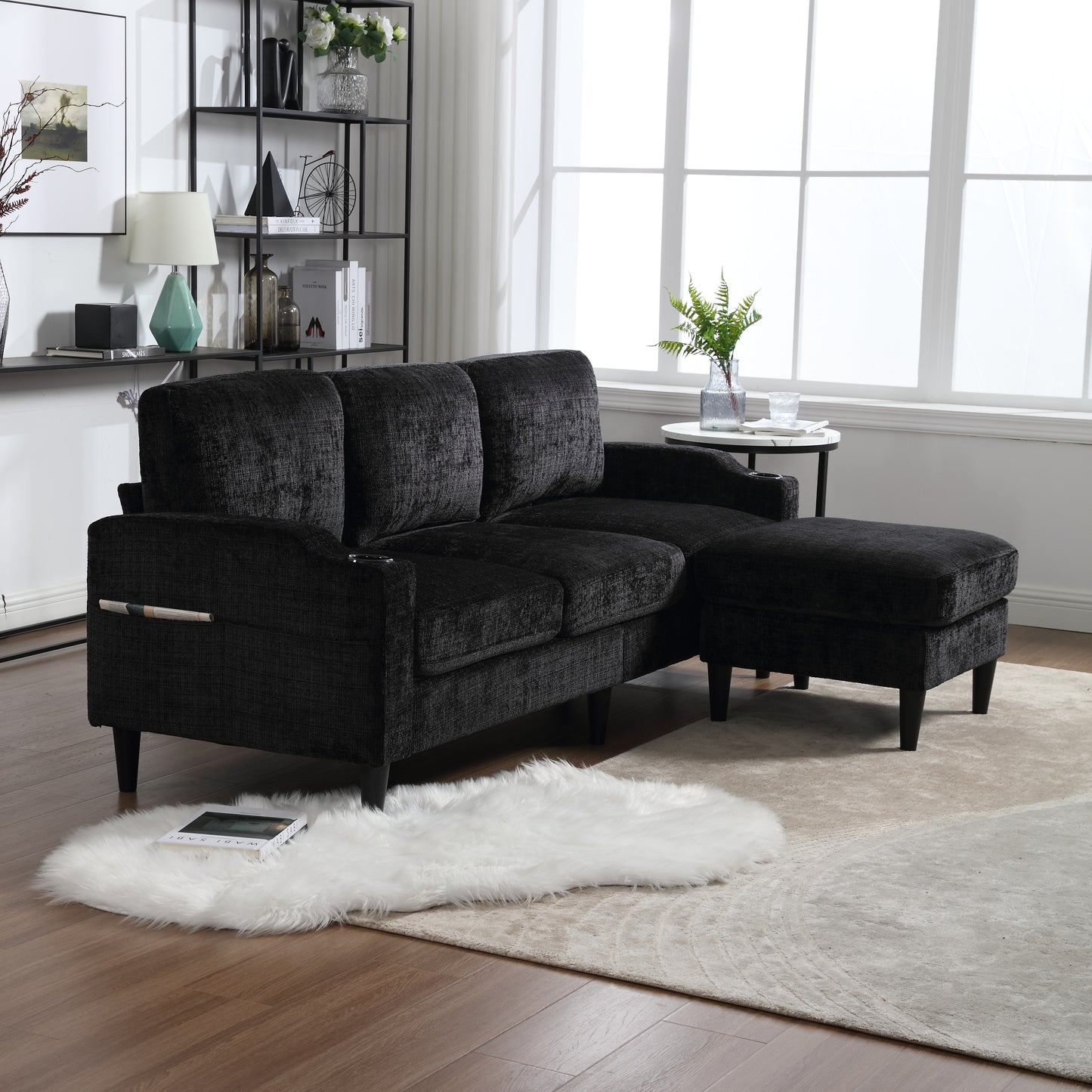 Black textured fabric sectional sofa with chaise lounge and wooden legs for a modern living room