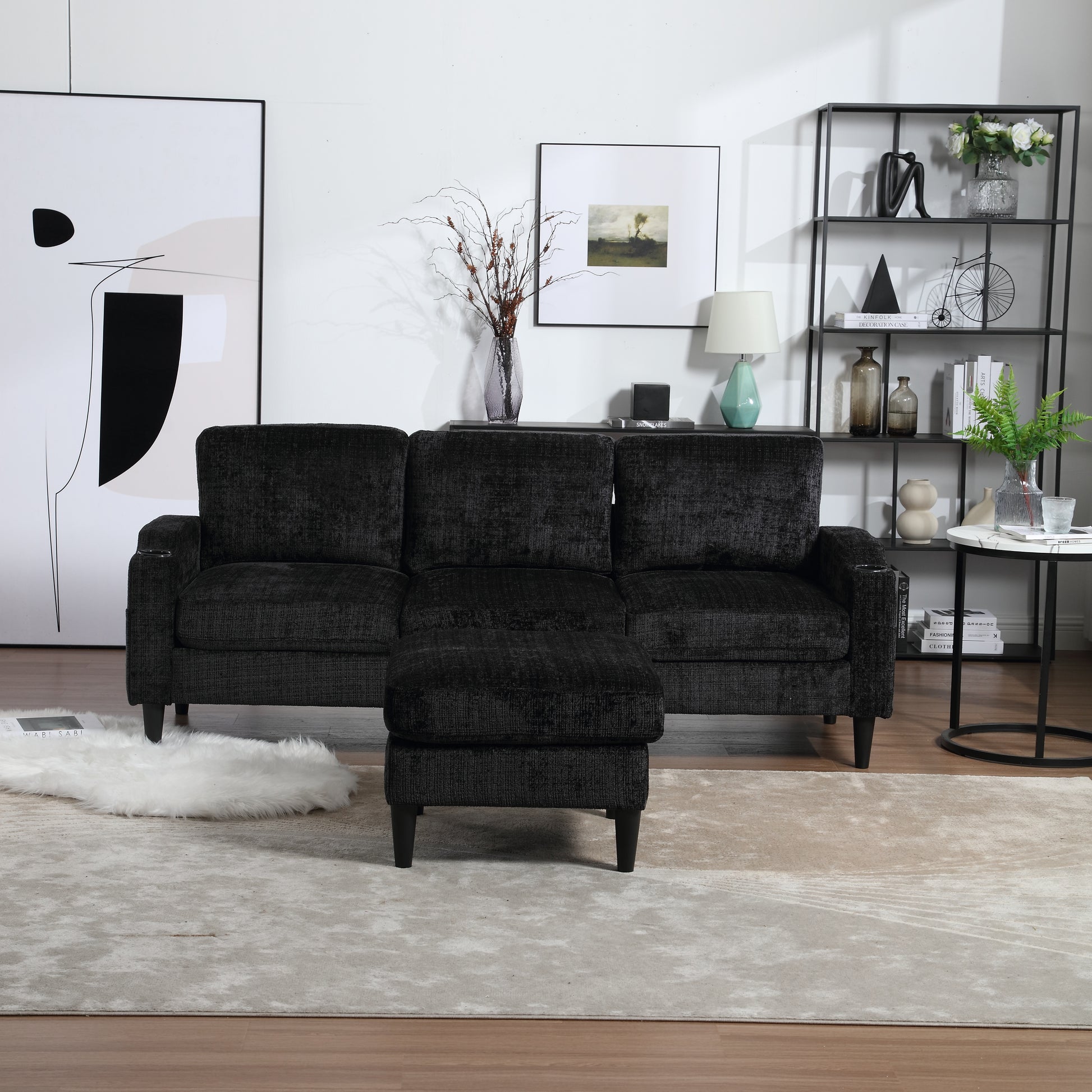 Black textured fabric sofa with matching ottoman perfect for modern living rooms