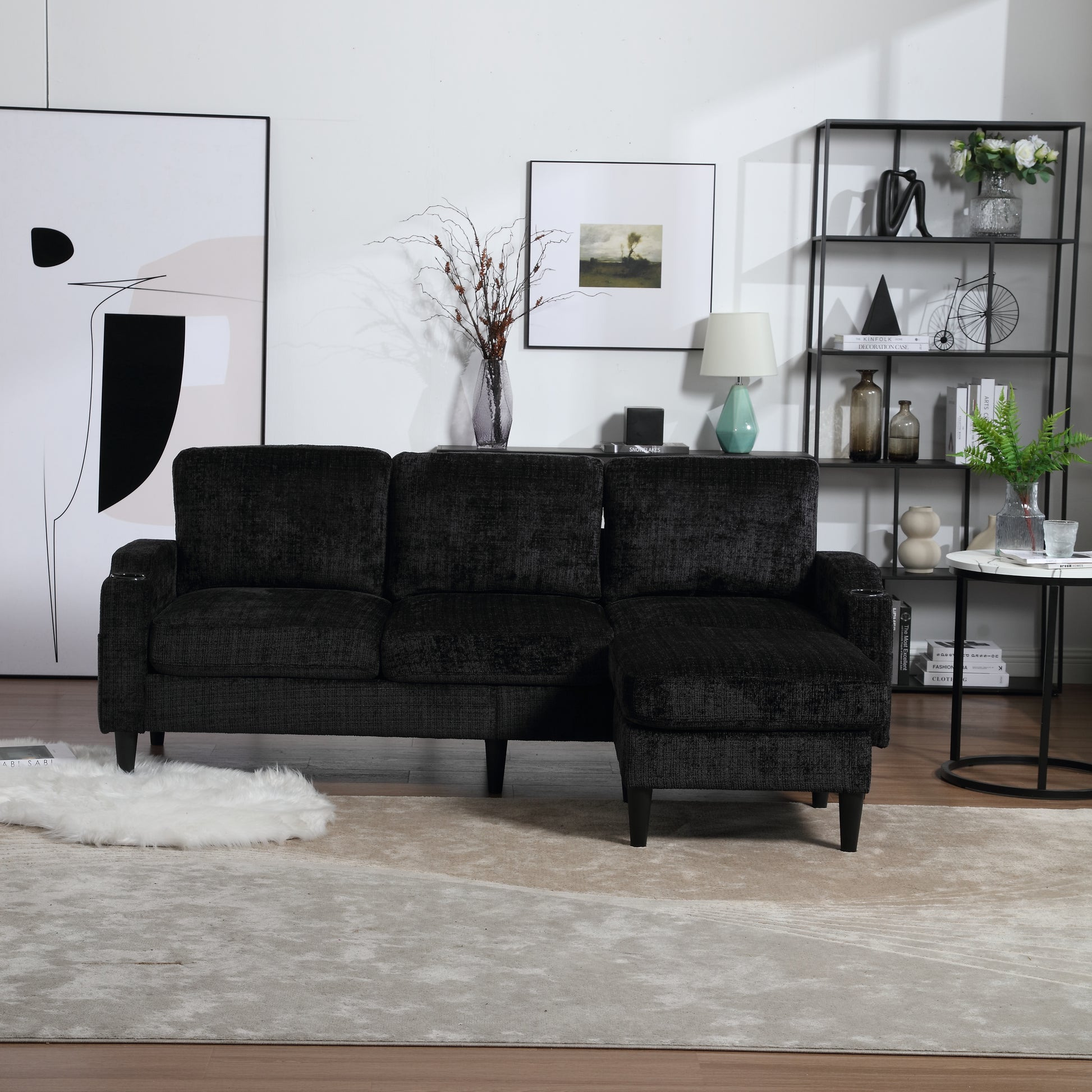 Textured black sectional sofa with chaise lounge perfect for modern living rooms