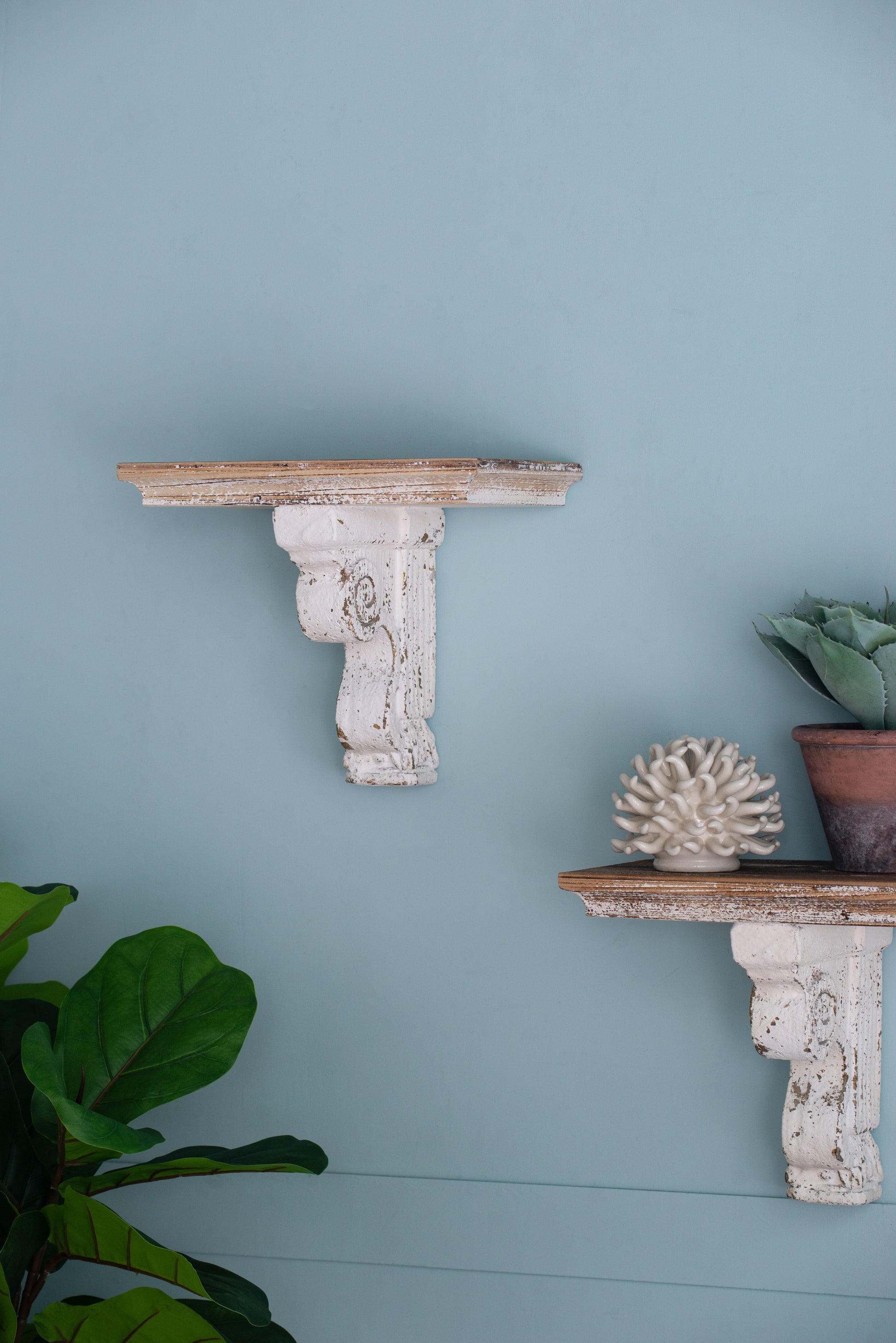 Antique white decorative wall bracket with distressed wood shelf