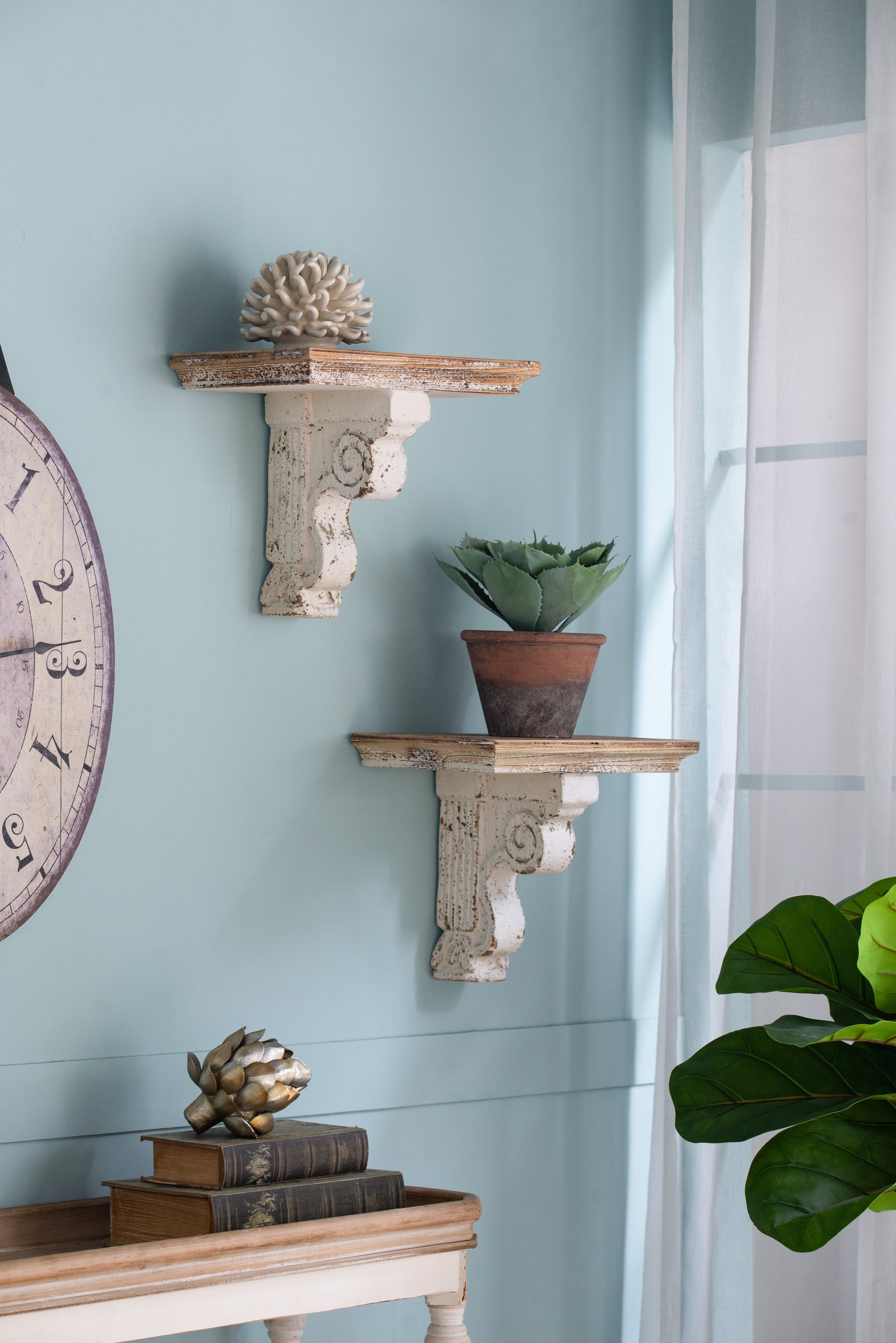 Ornate white wall shelf with distressed wood detail and scrollwork perfect for rustic decor