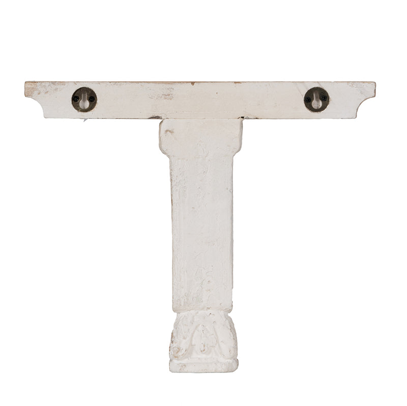 White decorative shelf bracket with distressed finish and carved detail