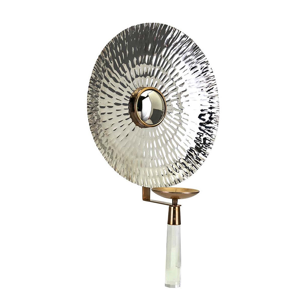 Silver hammered metal wall sconce with brass accents and crystal base for ambient lighting