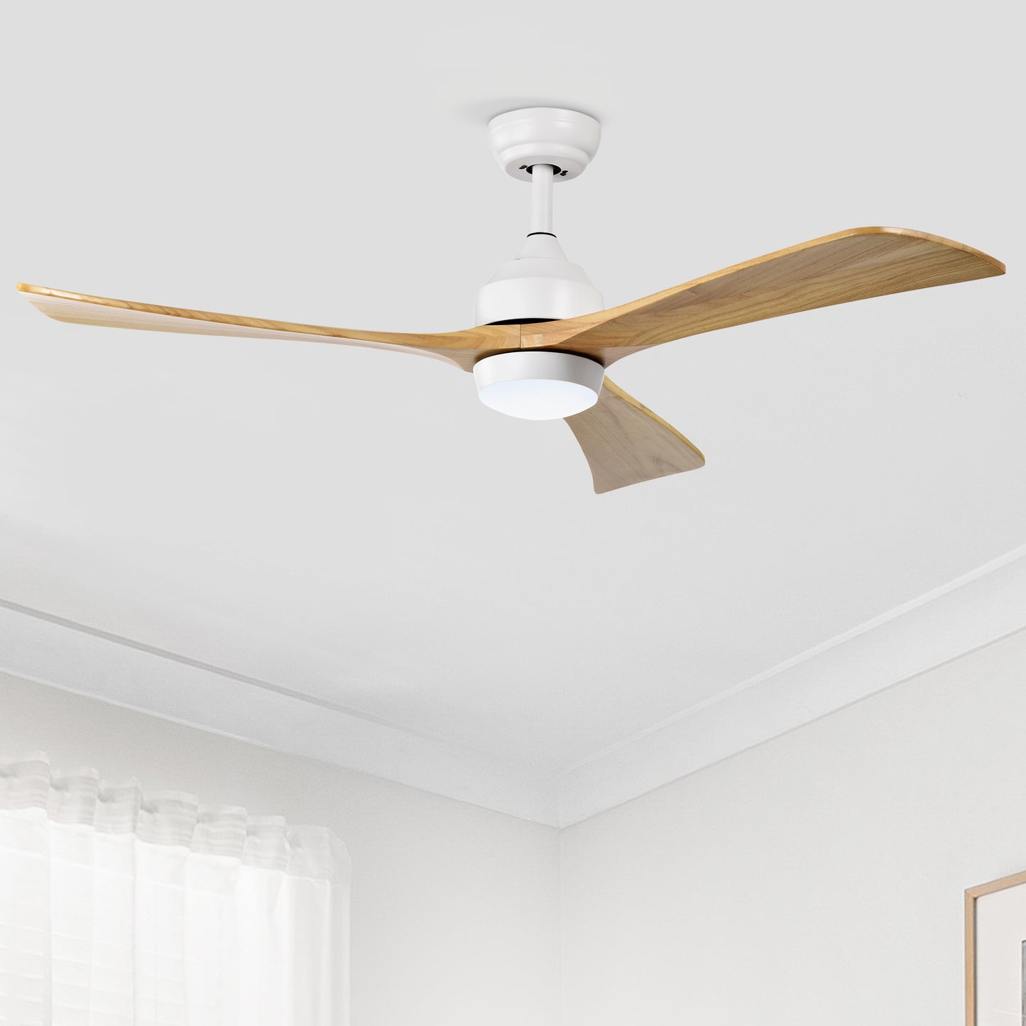 Modern white ceiling fan with three natural wood blades and integrated LED light