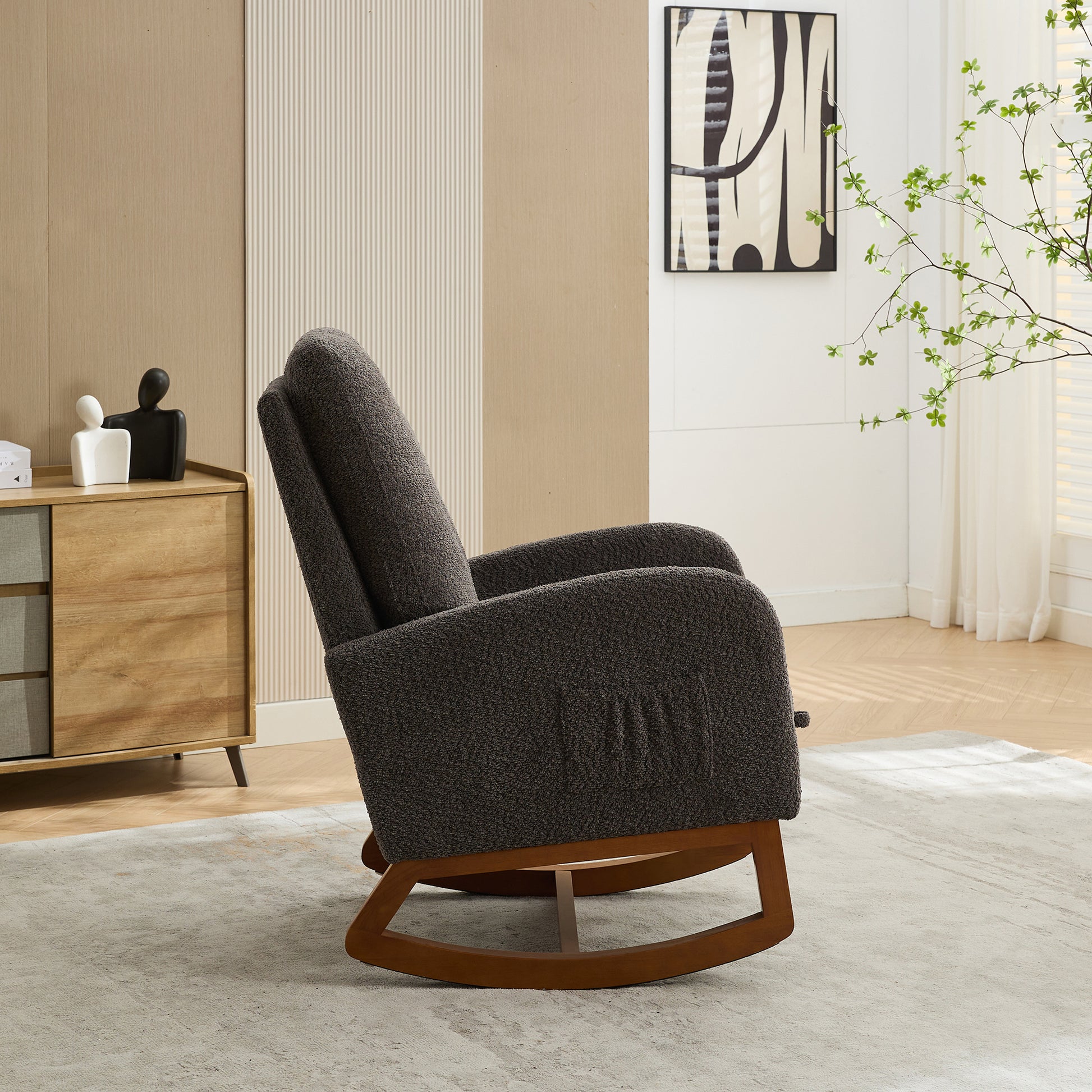 Plush dark grey boucle fabric rocking chair with a walnut wood base
