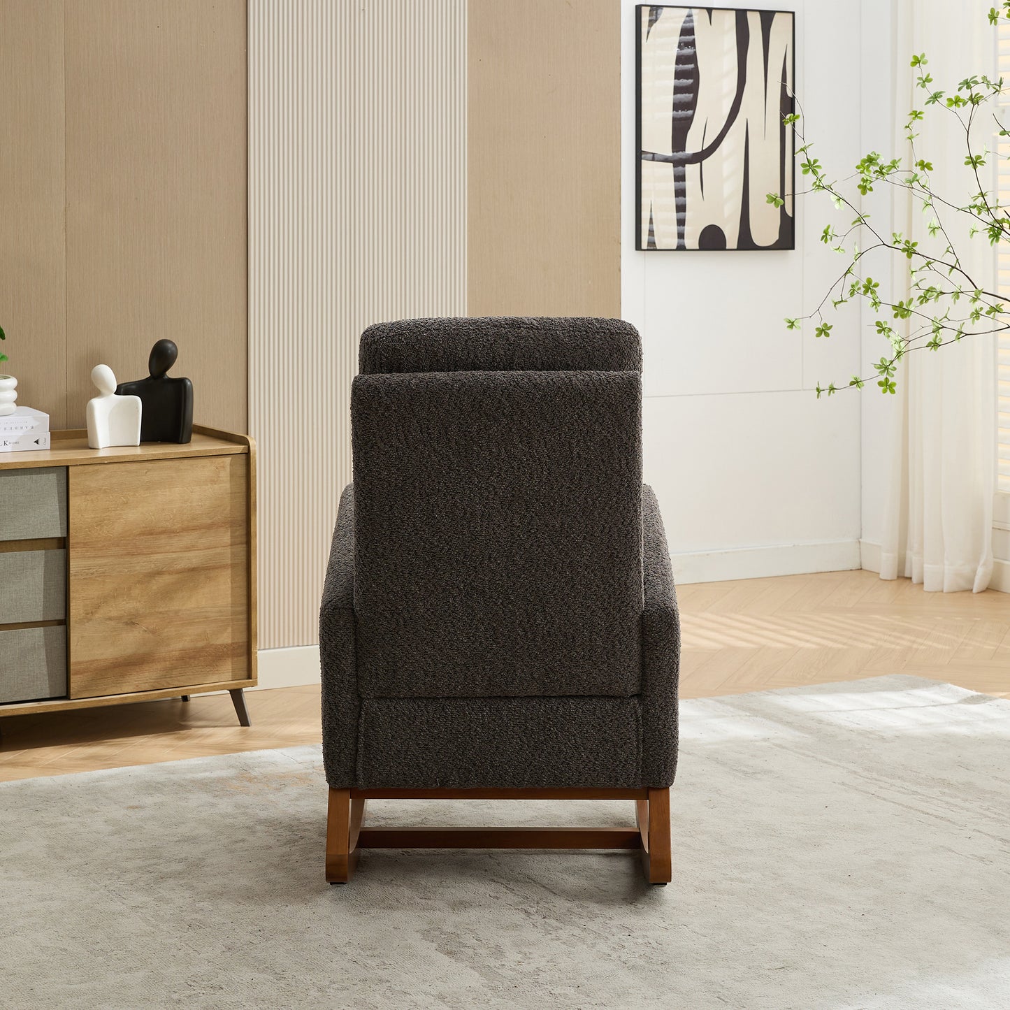 Dark gray textured armchair with wooden legs perfect for cozy living rooms