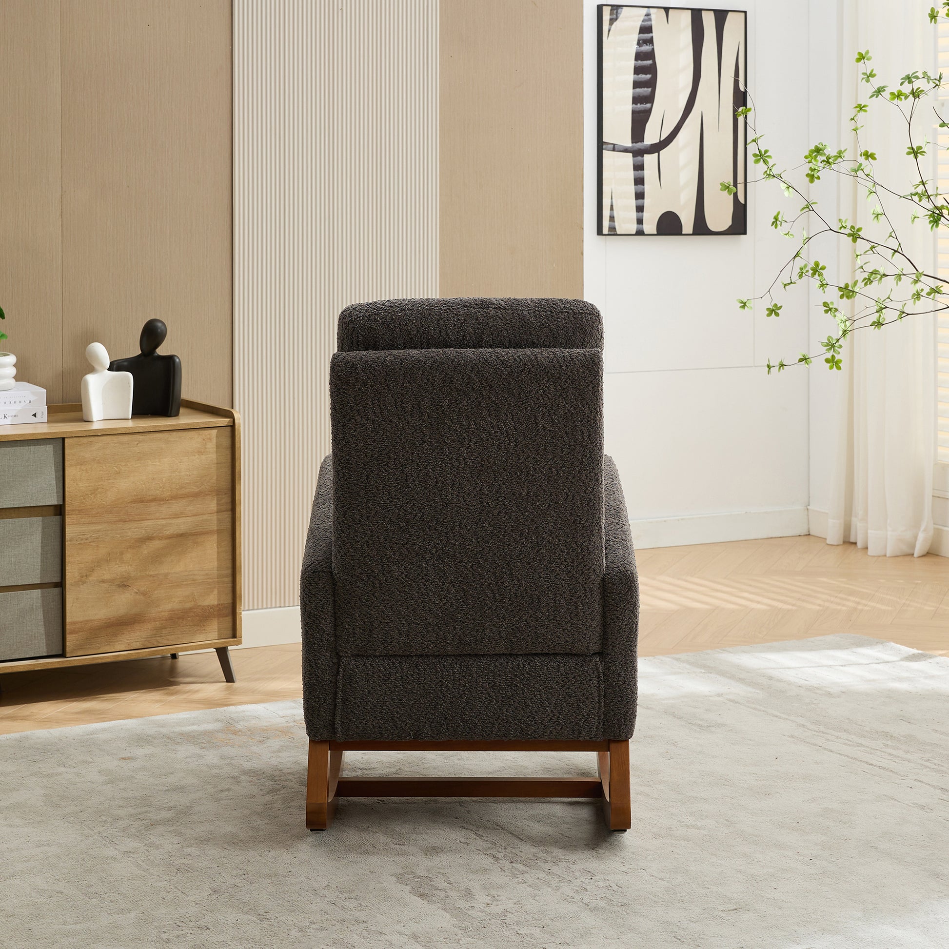 Dark gray textured armchair with wooden legs perfect for cozy living rooms