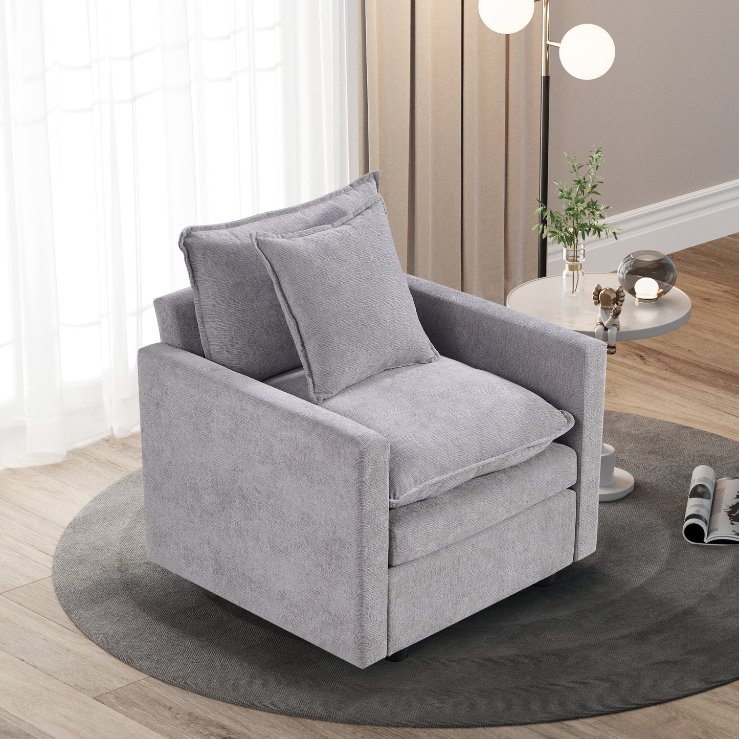 Plush grey fabric accent chair with deep seat and back cushions for ultimate comfort