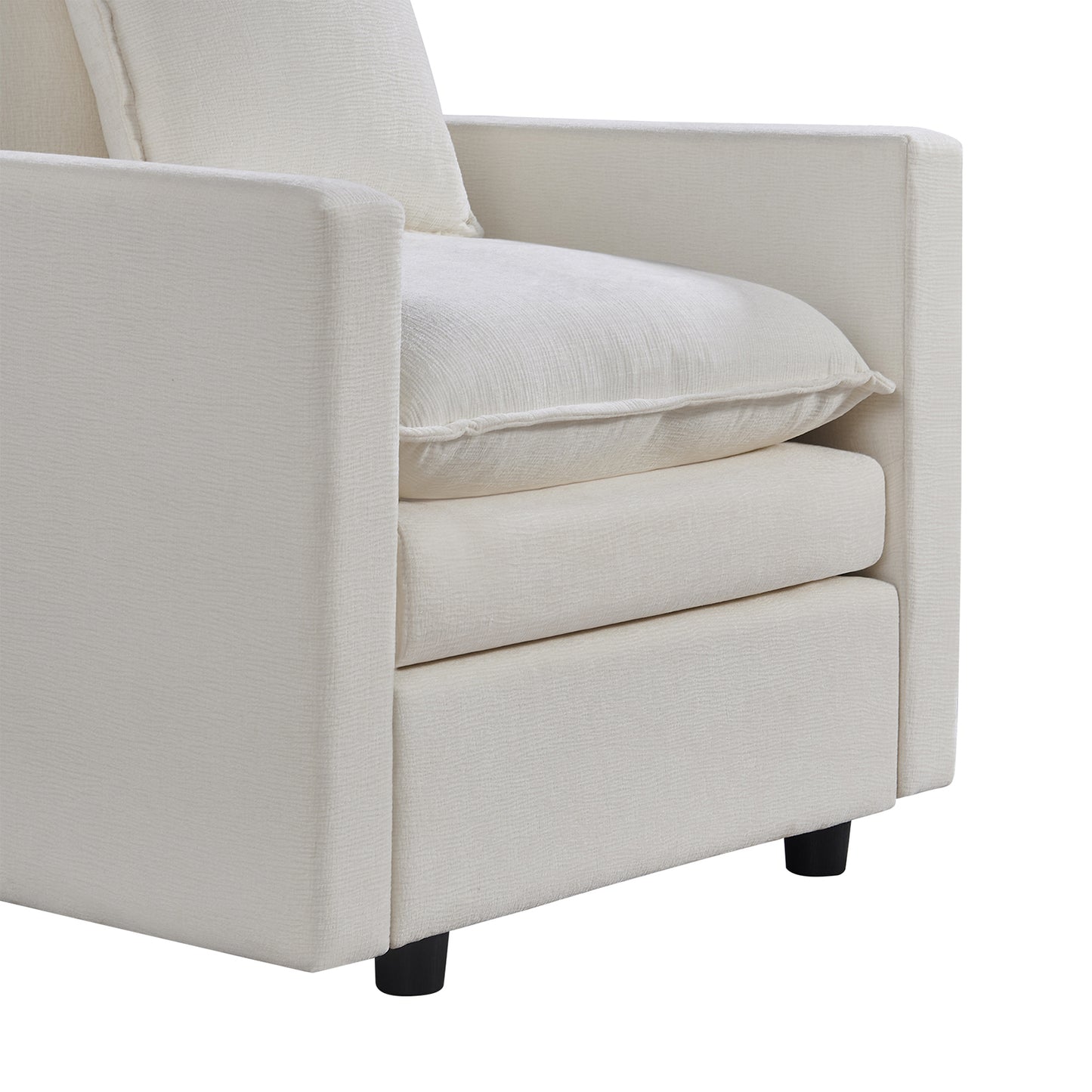 Closeup of a textured cream linen armchair showcasing plush seat and back cushions and square arms
