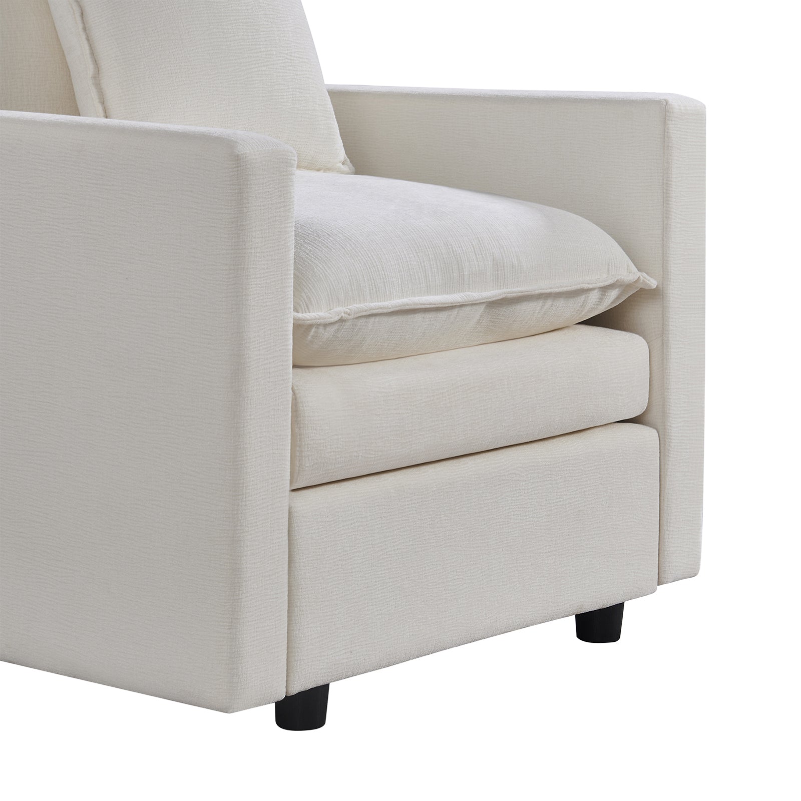 Closeup of a textured cream linen armchair showcasing plush seat and back cushions and square arms