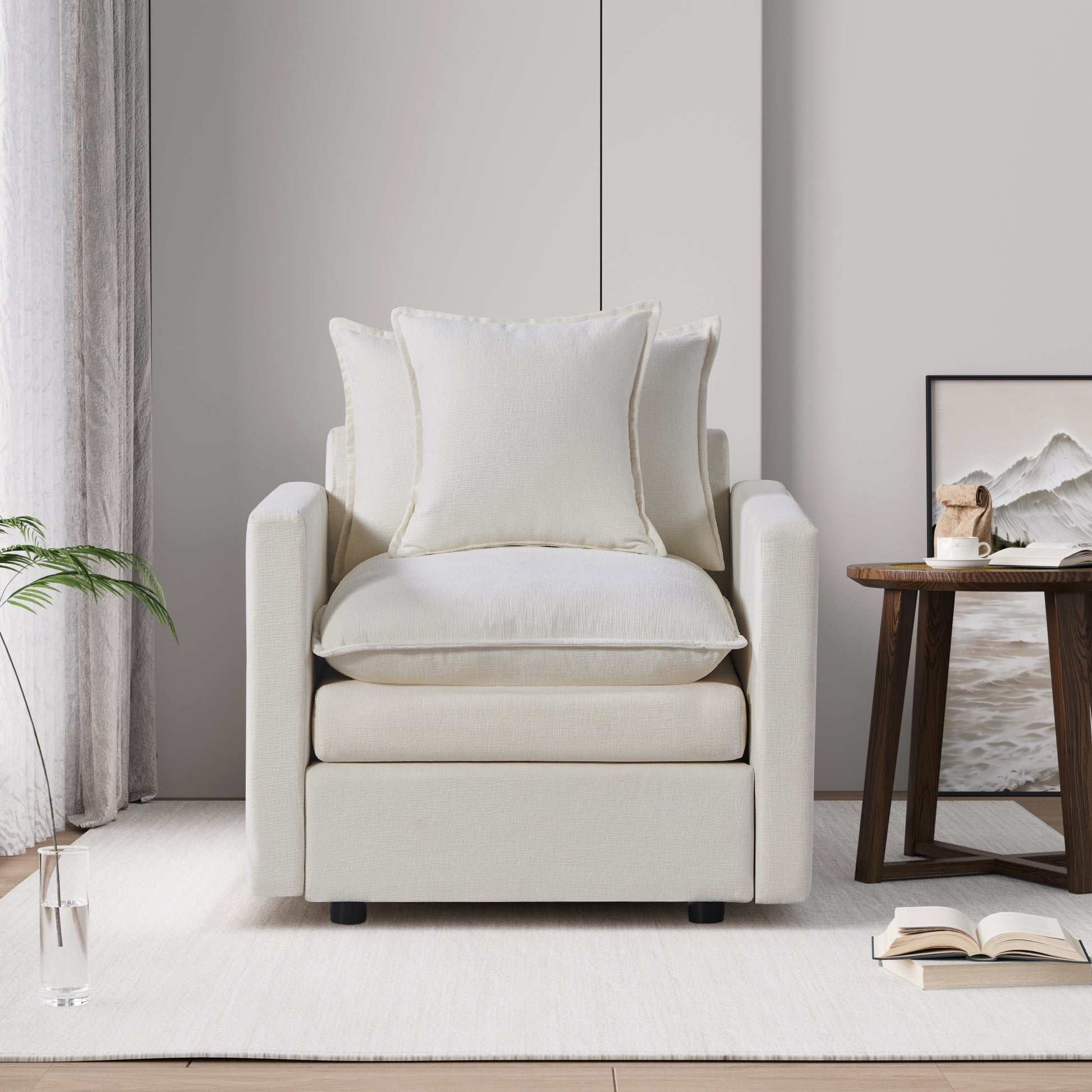 Plush cream fabric accent chair with thick seat cushion and two toss pillows