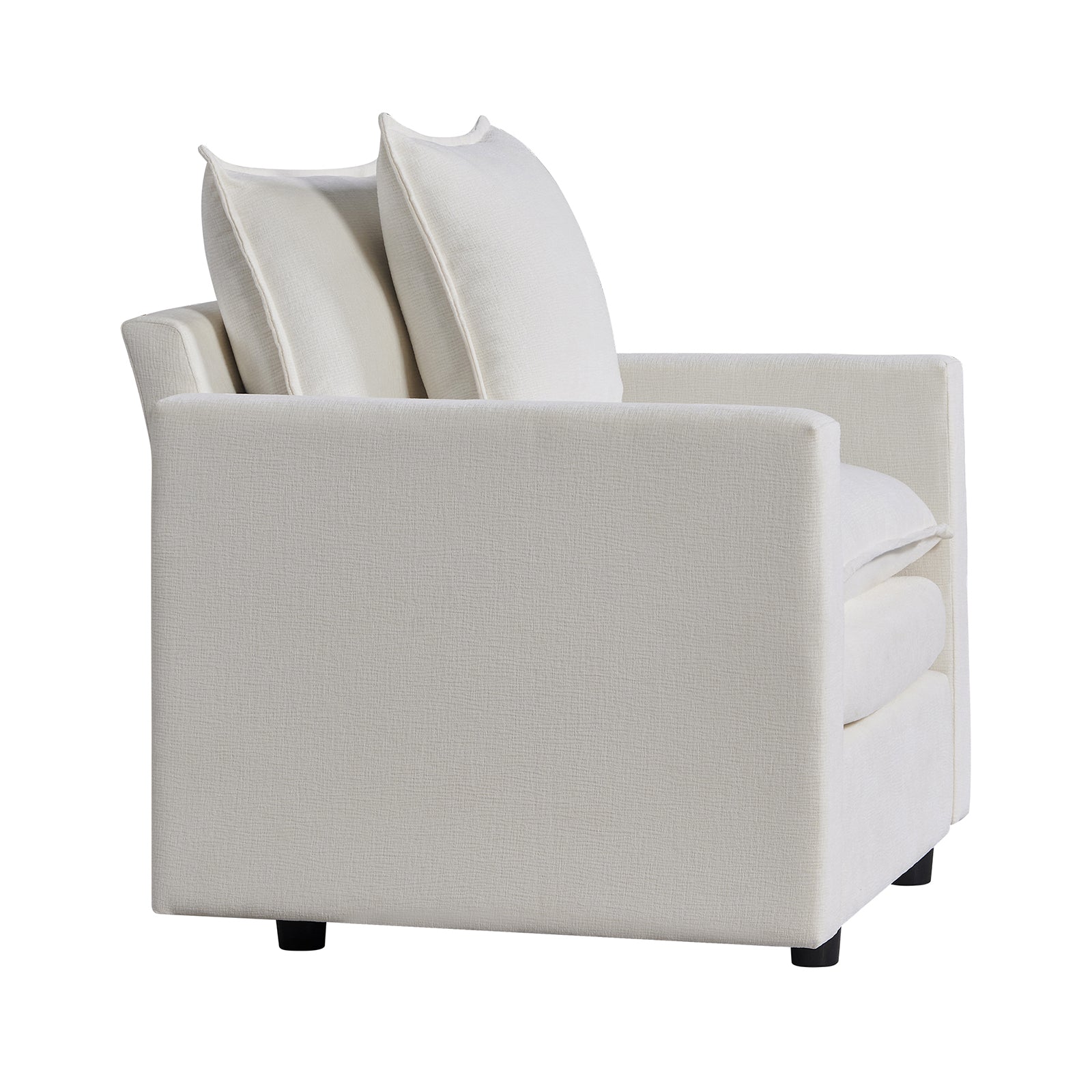 Textured cream armchair with plush back pillows for comfortable seating