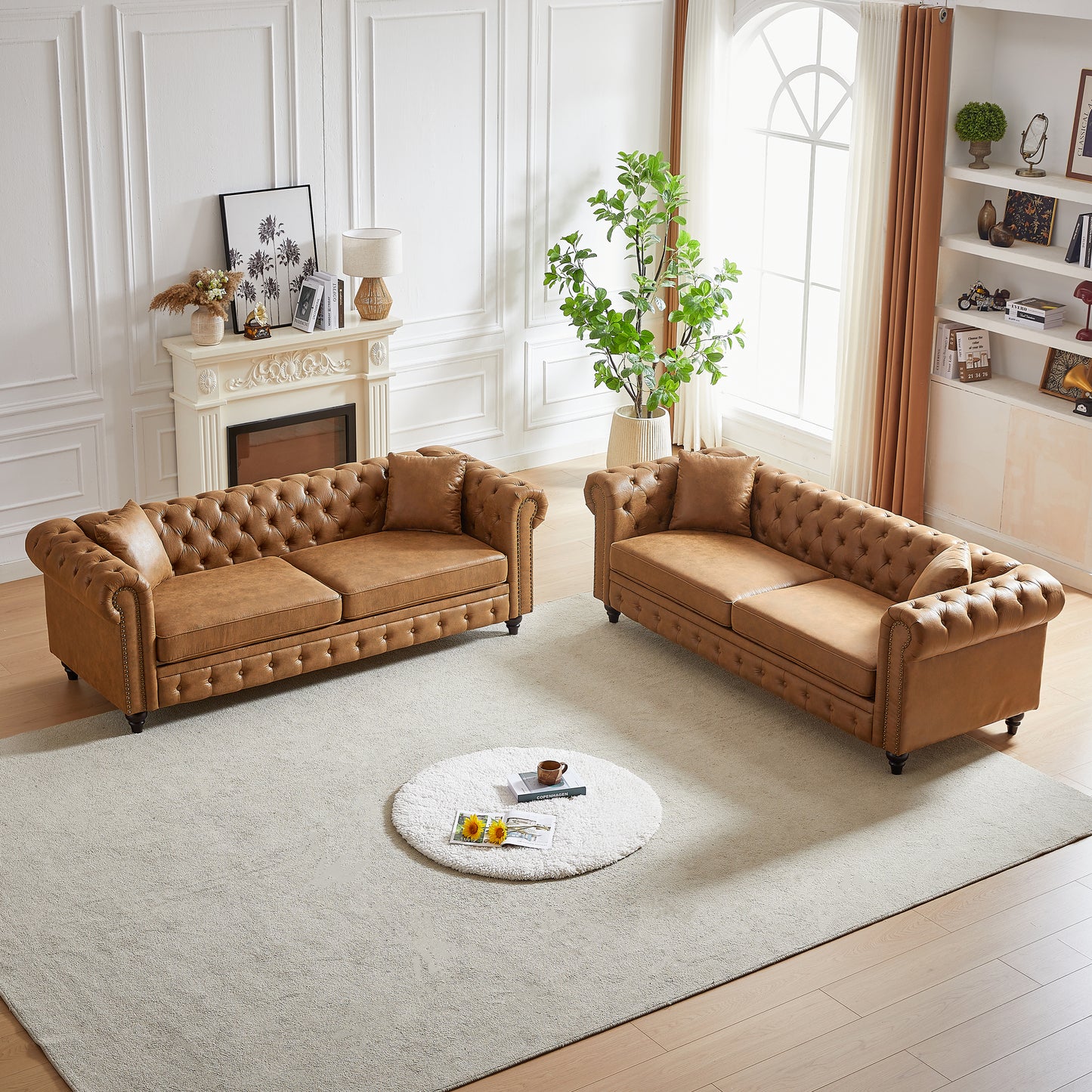 Brown leather chesterfield sofa with button tufting and nailhead trim detail
