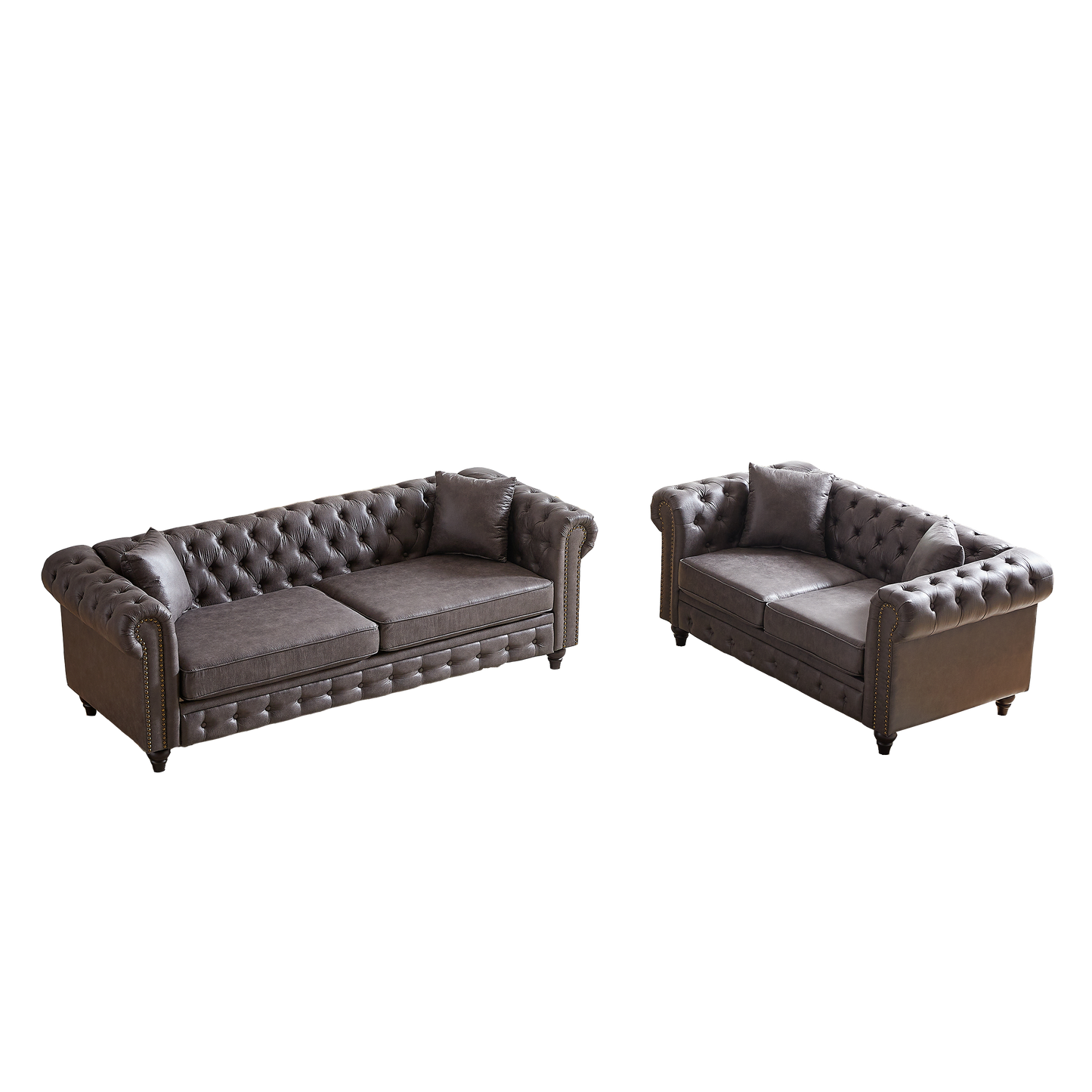 Dark brown tufted leather Chesterfield sofa with nailhead trim and plush cushions