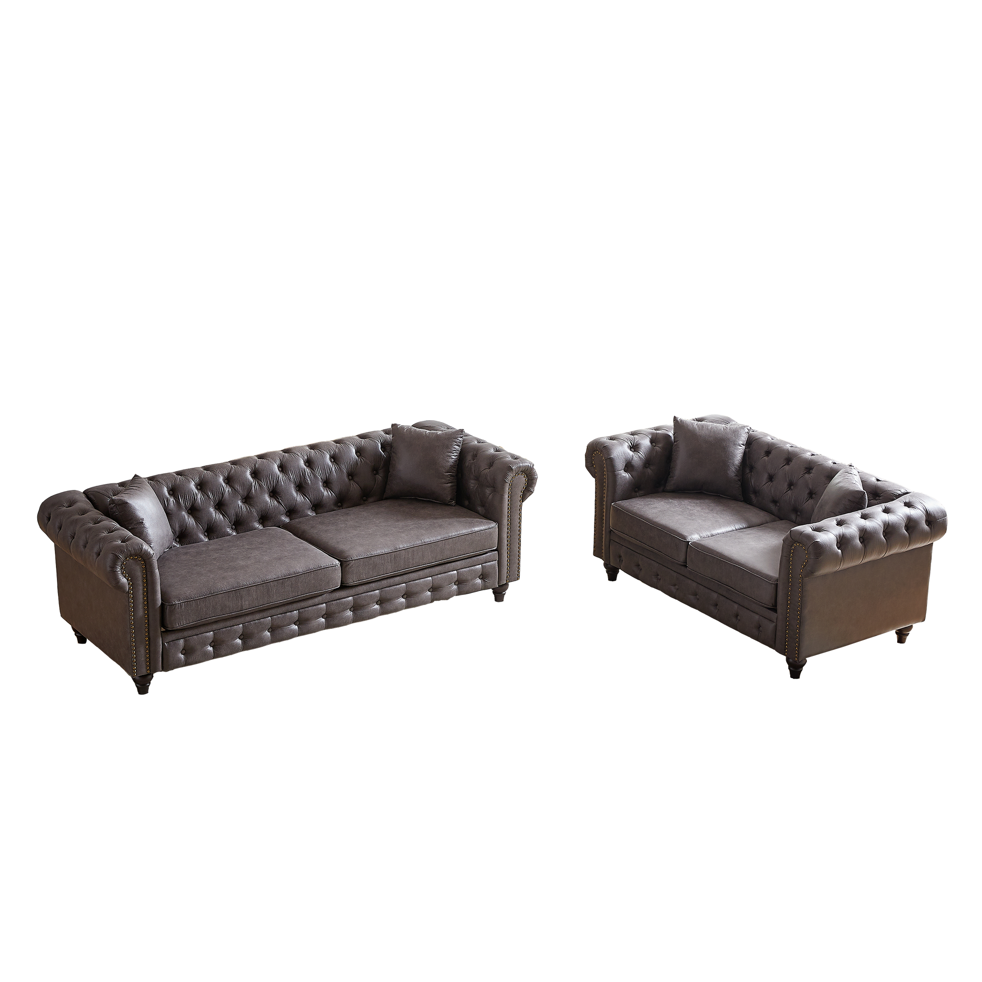 Dark brown tufted leather Chesterfield sofa with nailhead trim and plush cushions