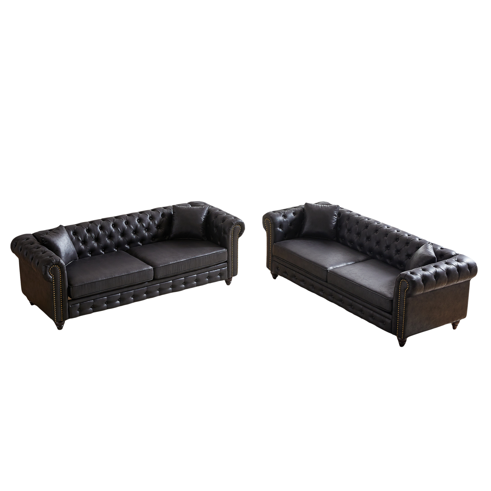 Dark brown leather chesterfield sofa with button tufting and brass nailhead trim