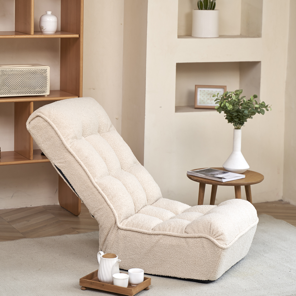 Plush cream floor chair with adjustable backrest for comfortable lounging